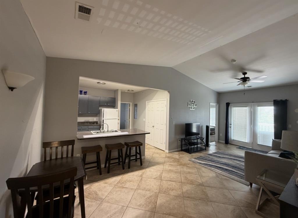 Welcome to a well-located condo with all of the conveniences of being close to the University of Oklahoma and great access to all that Norman has to offer. The unit includes a spacious living room and a fully equipped kitchen with a eat-in-bar. Each bedroom includes their own bath and walk-in closet. Furniture and appliances stay with the property. This unit is close to the pool.  Due to the owner-occupancy ratio, FHA, VA, Fannie Mae, Freddie Mac, or any other government loans are not able to be used.