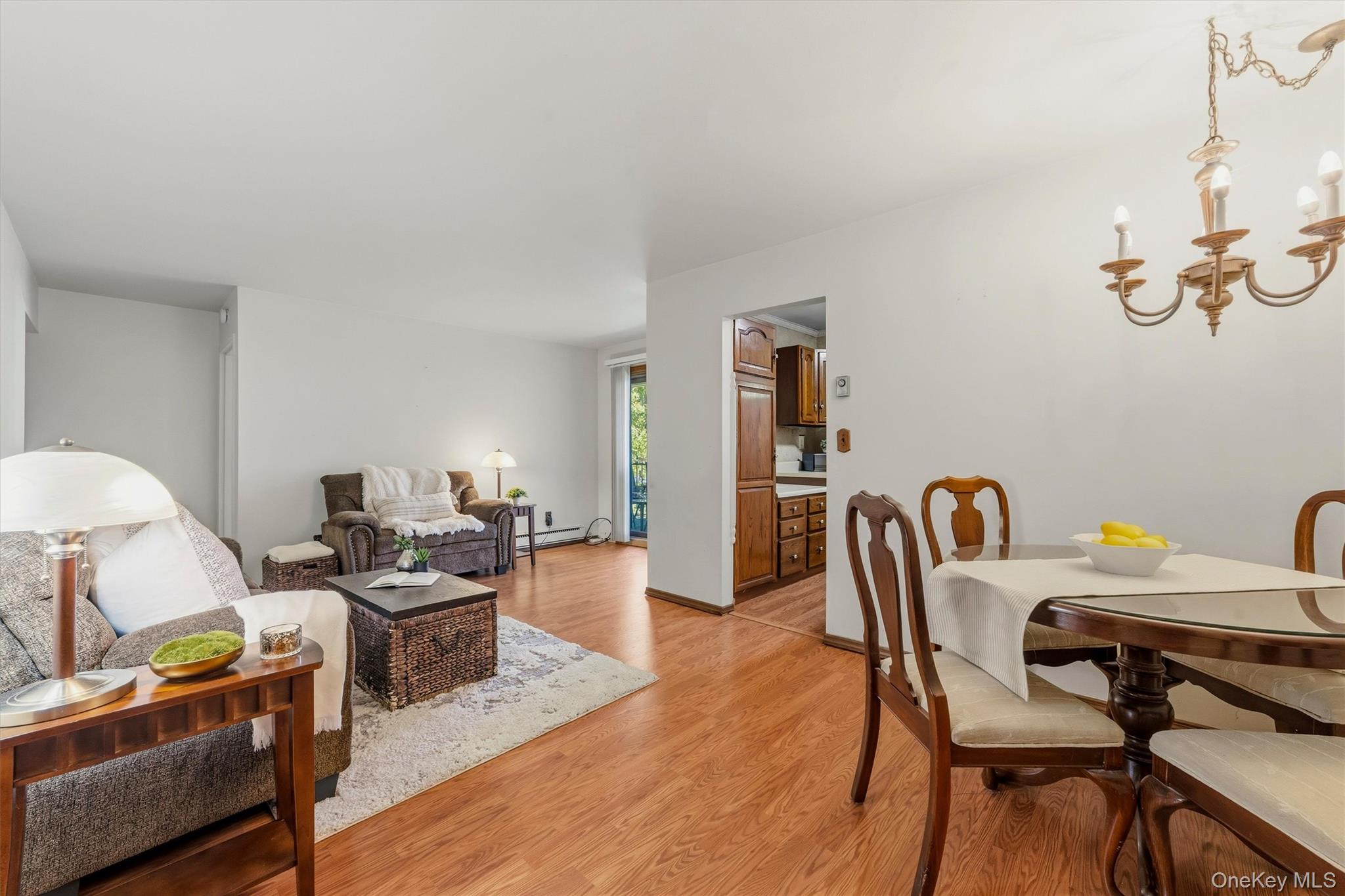 Easy living in this bright residence at Hartsdale Manor, featuring one spacious bedroom plus a versatile den. This well-designed unit offers a smart layout with living, dining areas, and generous closet space. Enjoy your morning coffee or unwind with a glass of wine on your private terrace. The kitchen features ample cabinetry and counter space. Down the hall, you’ll find the primary bedroom, a full bath, and a flexible den that’s perfect for a home office, hobby space, or library. Enjoy a well-maintained  community offering desirable amenities including an in-ground pool, on-site laundry, and convenient parking. The building is pet-friendly with board approval. Ideally located near shopping, restaurants, parks, the Hartsdale train station, and major roadways—perfect for commuters or anyone seeking a low-maintenance lifestyle in Westchester.