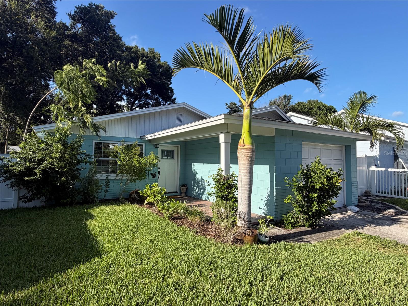 Come and see this beautiful 2 bedroom 1 Bath home in Pinellas Park Florida! Step into a large family room perfect for entertaining guests, new ceramic tile throughout the room, plenty of space for a dinning table and living area. The eat-in Kitchen has been updated with new countertops and a beautiful backsplash, enjoy room for a dry bar and kitchen table. The primary bedroom is spacious and has built ins in the closet making the most of the space. The second bedroom is good sized as well and is currently set up as an office. The bathroom has been updated with a new vanity, flooring, and tile surround shower/tub. Step into the backyard where you can relax with privacy! The backyard is completely fenced in and offers great shade from the trees. Sit back and relax beneath the pergola, grill out, or enjoy a campfire. This backyard is a great private retreat perfect for hosting. New Roof in 2016 and new Air condenser 2025. Close to shopping, restaurants, and public parks, while offering a neighborhood feel. Don't miss your chance to see this one, schedule your showing today!