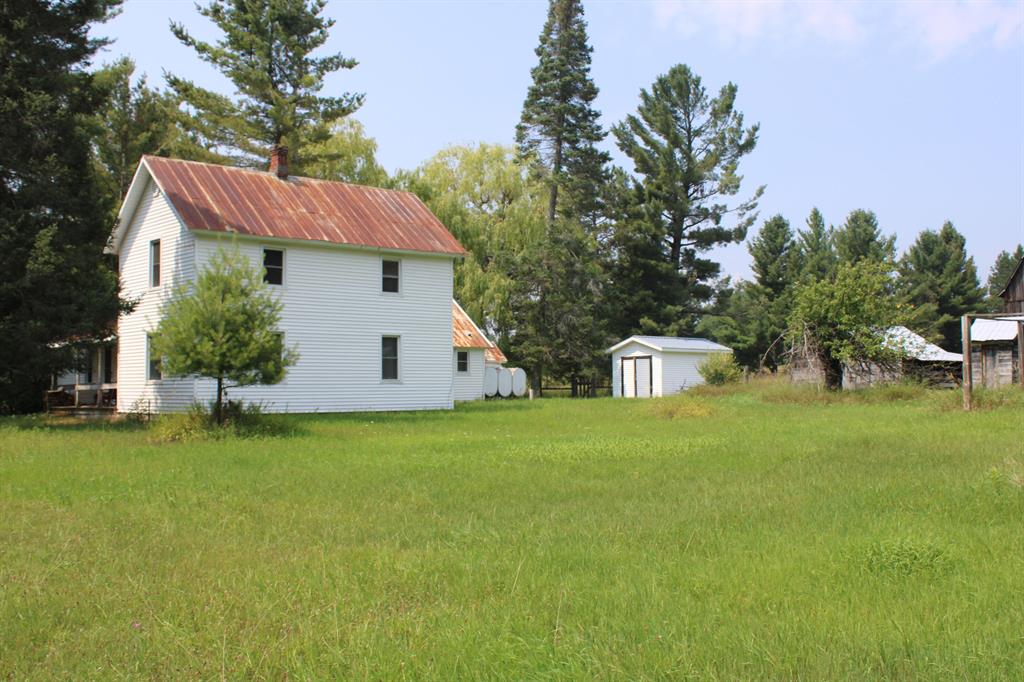 Located in Alcona County just outside of Barton City sits this cozy farmhouse on 160 acres! This property has served as a hunting getaway to the same family for almost 60 years. The home has been partially remodeled with a few of the rooms still needing some updating. The kitchen features exposed log that was from the original build in the 1880s along with a vintage Heartland Oval wood burning stove. Water is supplied by a traditional deep well and also has a hand pump for backup.  The heat source is baseboard through an oil-fired boiler along with a wood fireplace. Outside you will find some sheds, wellhouse, chicken coup and old farm barn. The land has unmatched diversity with a pond & a wetland area where the Buff Creek flows through, approximately 10 acres total over several different fields that could possibly be farmed or used for food plots,  rolling wooded hills and some stands of row pines that could possibly be harvested for some additional income along with various apple trees scattered around the property. There are established trails leading you around for great access to all parts. Located just down the road from Jewell Lake additional recreation options. Call today for more information.
**Maps contained on our sites are there to simply depict the over all layout or shape of a given property and show what it looks like from an aerial view. These maps are neither a legally recorded map, or any type of a legal survey and should never be used as such. Also "Acreage" amounts are displayed as according to the information we have obtained through local government and are in no way guaranteed or warranted to be exact**
