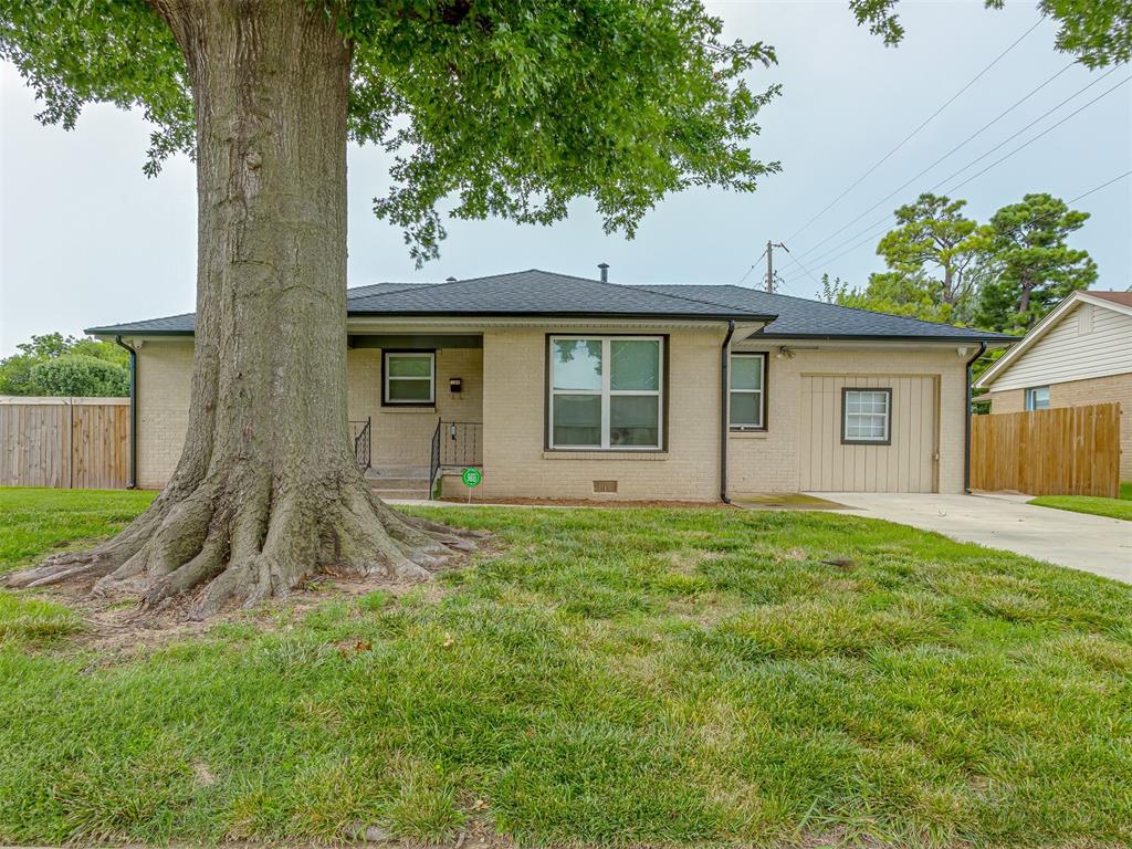 Welcome to this charming home situated on a large corner homesite in the desirable Stanford Homes Addition! Perfectly blending classic character with modern updates, this home features freshly refinished original hardwood floors, updated windows, and fresh paint inside and out. Roof replaced in 2024. The kitchen is updated with beautiful granite countertops, and all appliances will stay, making it truly move-in ready. All appliances to stay. You’ll appreciate the completely remodeled bathroom and the newer central heating and air system for year-round comfort. Situated on a spacious corner lot with backyard access, this property also includes an oversized detached garage complete with water and gas hook-up—ideal for extra storage, a workshop, or parking. With its thoughtful upgrades and inviting curb appeal, this home is a perfect choice for first-time buyers or those looking to downsize. Exterior security cameras to stay w/exception of one above garage.