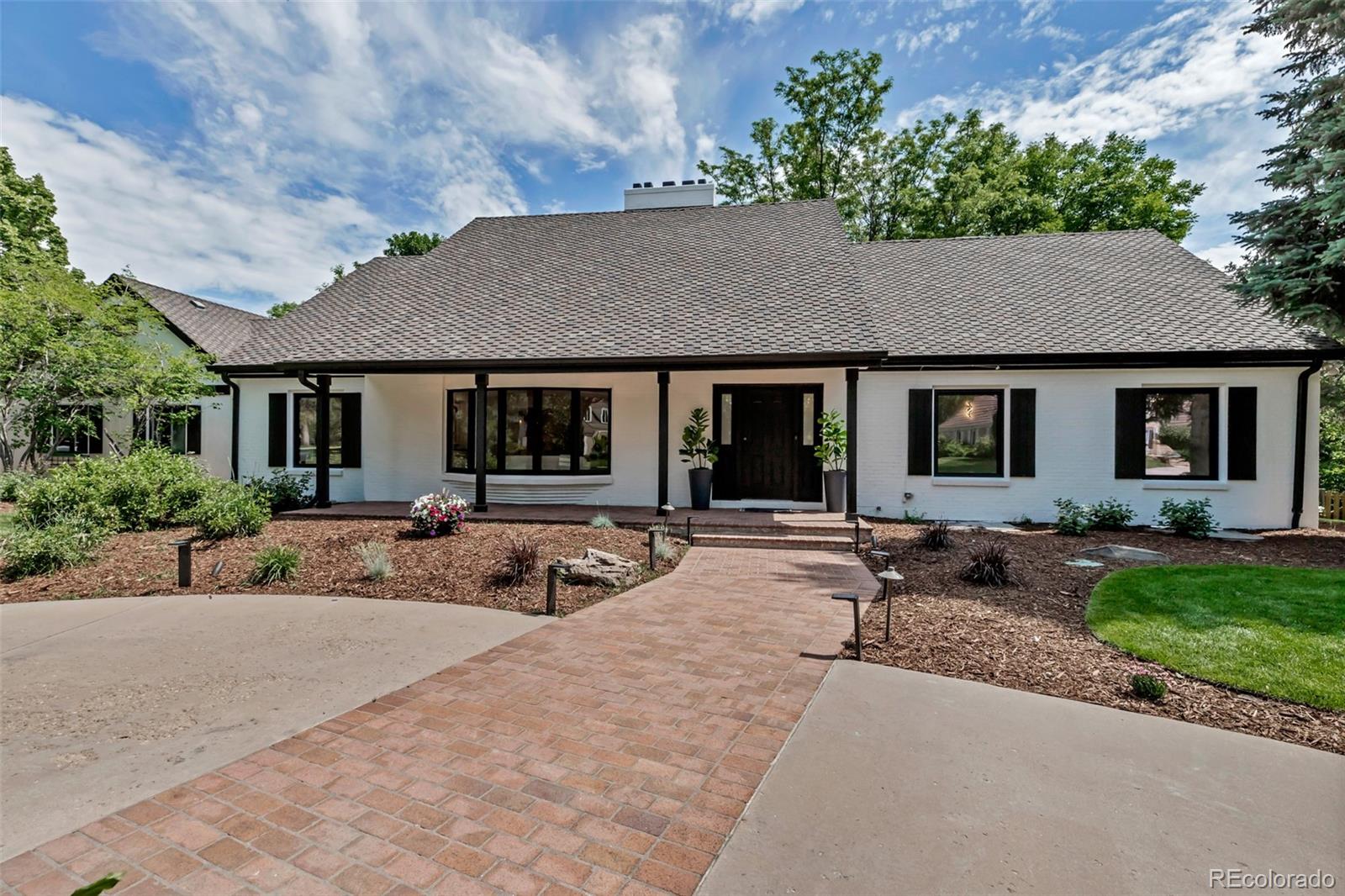 Now priced to reflect today’s market — this beautifully renovated Tudor in Greenwood Village offers exceptional value at this level.Set on a generous lot with a full-size pool, this home blends timeless architecture with thoughtful updates throughout. Natural light fills the main living spaces, complemented by vaulted ceilings, bay windows, and a layout designed for both everyday living and entertaining.The kitchen features Italian Trans Quartz countertops, an updated island, stainless steel appliances, and a breakfast nook overlooking the backyard. The open dining and family areas create an inviting flow ideal for gatherings.Upstairs, the spacious primary suite includes a gas fireplace and a 5-piece Carrara marble bath with steam shower, freestanding tub, and custom walk-in closet. Additional bedrooms offer flexibility for guests, home office, library, or retreat space.The finished basement provides expansive bonus space suitable for media, fitness, or creative use. Outdoors, enjoy a private backyard with pool, mature landscaping, and direct access to nearby trails.With recent pricing adjustment, this home presents a rare opportunity to secure Greenwood Village living with a pool at a compelling value point.