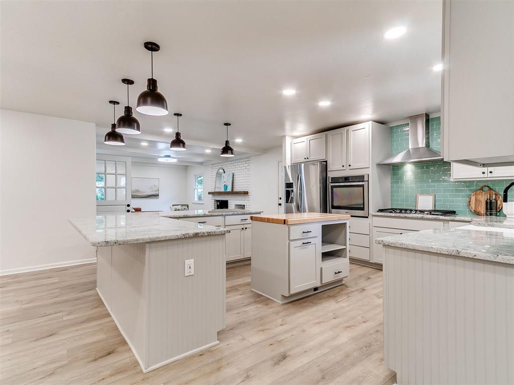 Welcome home to The Village! Perfectly located just minutes from Lake Hefner, you'll love having easy access to miles of walking and biking trails, restaurants, and everything this sought-after neighborhood has to offer. This beautifully remodeled 3-bedroom, 2-bath home features spacious, open living areas designed for both everyday living and entertaining. A bonus living space at the back of the home offers endless possibilities—a second family room, game room, home office, or playroom. The stunning kitchen is truly the heart of the home, showcasing a large butcher block island, gas range, abundant cabinetry, and plenty of space to gather with family and friends. Whether you're hosting holidays or enjoying a quiet evening at home, this layout makes it easy. With thoughtful updates throughout and an unbeatable location, this move-in-ready home is one you won't want to miss.