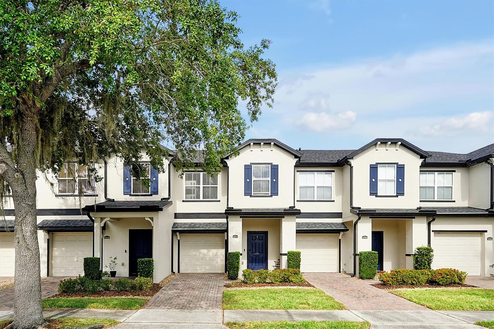 Under contract-accepting backup offers. Welcome to this charming townhome nestled in the heart of Lake Nona. It offers a functional layout, perfect for both first-time homebuyers and investors. Featuring ceramic and wood laminate flooring throughout, the open-concept kitchen is adjacent to the dining and living areas, providing a seamless flow with an exceptional view of the greenbelt, offering a tranquil setting to unwind.
Upstairs, the master suite features an en-suite bathroom and generous closet space. Two additional bedrooms share a full bathroom. The community offers a pool and playground. The property is situated within an A-rated school district, ensuring quality education just 18 minutes from  Orlando International Airport. 10 min to Medical City. This home provides unparalleled access to top-tier healthcare, dining, and recreational options. Competitively priced, it offers exceptional value in one of Orlando's most sought-after neighborhoods. The property is poised to attract significant interest. —Opportunities like this don't last long!