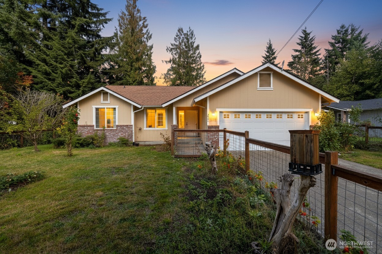 Surrounded by the beauty of misty mountains, this inviting home offers the perfect blend of comfort & PNW charm. An abundance of natural light fills the open floor plan, enhanced by vaulted ceilings & a warm wood-burning fireplace. Kitchen features a brand new fridge, spacious walk-in pantry, & breakfast nook. Primary bedroom includes a private ensuite bathroom, offering a peaceful retreat. Step outside to spacious front & back yards w/ample garden space, perfect for relaxing and entertaining. In the spring, enjoy vibrant blooms & a variety of fruit trees. Whether you’re seeking a peaceful escape or an active lifestyle, you’re only 45 mins from Mt. Baker & 40 mins from Bellingham, giving you easy access to all your favorite adventures!