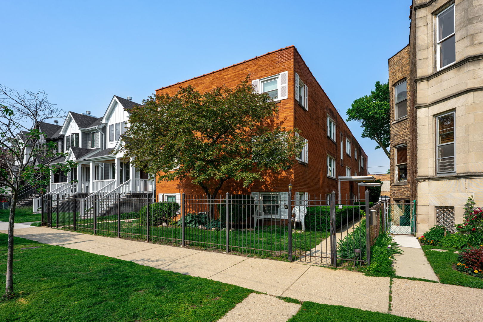 Bright & sunny, top floor 2 bed 1 bath condo located in Ravenswood! Hardwood floors flow throughout the entire unit, with the living room featuring a gas fireplace creating a relaxing & cozy space. The large kitchen is updated with modern finishes; white cabinets, granite countertops, & all stainless steel appliances. The kitchen has tons of counter space and cabinet storage space, an eat-in island space and a combined dining area. In-unit washer & dryer closet located off of the kitchen. This unit has two generously sized bedrooms with plenty of closet space for additional storage. The full bathroom has recent updates with modern finishes. Deeded parking space included! Conveniently located near several public transit CTA stops & Ravenswood Metra station. In close proximity to grocery stores, gyms, restaurants, bars, parks, and more! Enjoy city living in this Northside gem!