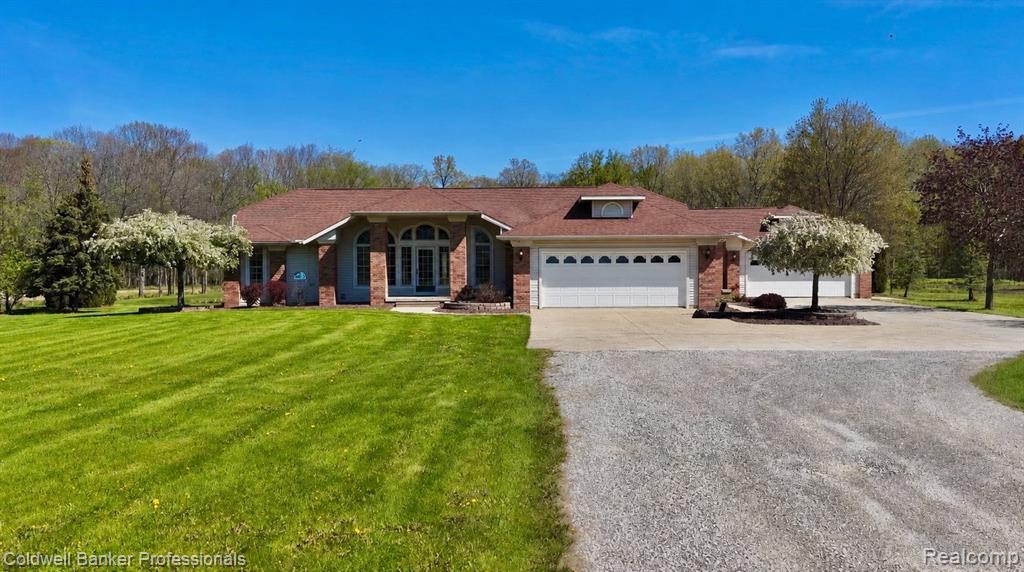 Beautiful 4-bedroom, 2.5-bath home set on 5.25 acres, offering the perfect balance of space, privacy, and functionality. This well-maintained property features spacious living areas filled with natural light, creating a warm and inviting feel throughout.A standout feature of the home is the inclusion of two kitchens and two laundry rooms, providing excellent flexibility for multi-generational living, extended guests, or added everyday convenience. The layout allows for a variety of uses, making it easy to adapt to different lifestyles.Outside, you’ll find a 4-car garage with plenty of room for vehicles, storage, or hobbies. The 5.25-acre lot offers open space and endless potential, while the beautiful pond in the backyard creates a peaceful, scenic setting that feels like your own private retreat.Ideal for buyers looking for land, versatility, and room to grow.