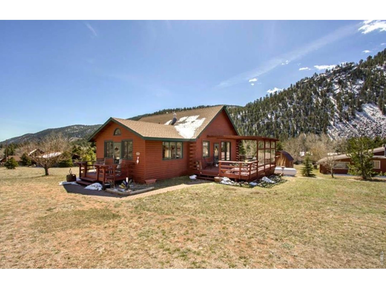 OWNER FINANCING AVAILABLE! Experience mountain living in this custom handcrafted log home in beautiful Poudre Canyon! Built by the original owner and meticulously maintained, this 2 bedroom, 2 bath home with loft sits on just under 1/2 acre and offers year-round living or the perfect seasonal retreat. Features include vaulted ceilings, hand-hewn log beams, open floor plan, tongue-and-groove paneling, walk-out basement with expansion potential, forced air heat + wood furnace heating system, a whole-house backup generator, a tankless water heater and a swamp cooler. Enjoy incredible mountain views, abundant wildlife, and fresh air from the spacious deck. Property includes carport, large storage shed, RV pad with electric and water hookups, private well is potable water for inside the house and irrigation well is a community source for the lawn, septic, and installed radon system. Located just 2 minutes from the Cache la Poudre River and 1 hour from Fort Collins - a true Colorado mountain escape!