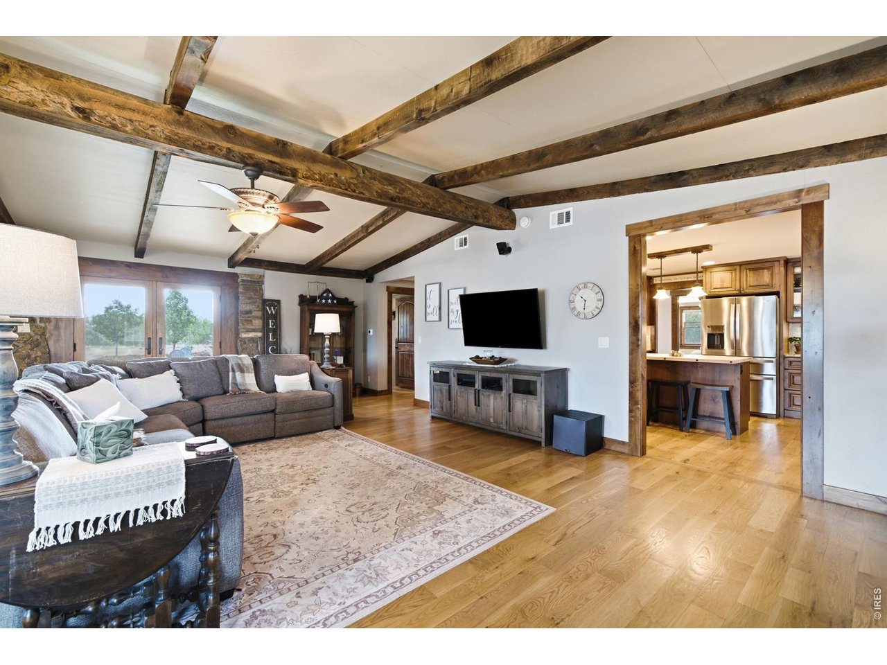 Tucked into the foothills of Loveland, Colorado, this beautifully remodeled 2-bedroom, 1-bath home offers the perfect blend of timeless charm, elevated design, and peaceful country living. Thoughtfully renovated from top to bottom, every finish was hand-selected-from the custom European cabinetry and white oak hardwood floors to the cozy wood-burning fireplace that brings warmth and character to the home.Situated on 2 acres with no HOA, the property features beautiful mountain views, a 24' x 48' shop, and the freedom to make the space your own. Bring the animals, create a hobby farm, work on your favorite projects, or simply enjoy the extra breathing room.