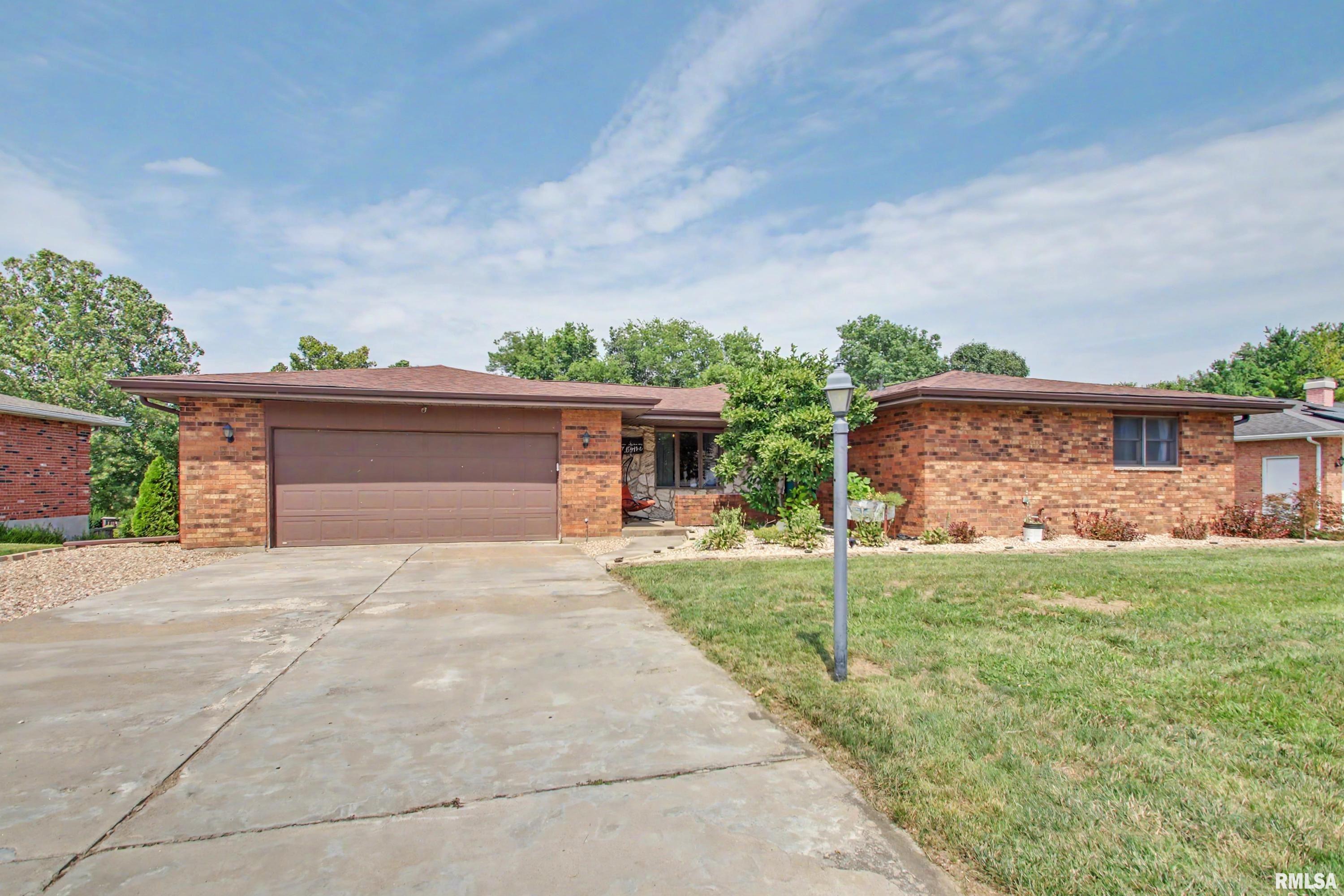 COMING SOON!  Attractive 3–5 bedroom brick ranch in a desirable south-side location! This brick beauty has a great main floor layout leading out to a deck overlooking the beautiful backyard with patio, gazebo and firepit area!  Well maintained home with updated bathrooms in ’25 & ’26. Large primary bedroom offering more space, if you have large size furniture!   Basement offers additional two rooms used as bedrooms (no egress), family room plus a bar with refrigerator conveying and stools that can convey. Insulated two-car garage includes window A/C and heater.  Two sheds will convey.  Chicken house and chickens will be removed. Lagoon fee: $45/qtr.  Great indoor and outdoor space for entertaining! Closing to be after 10/15/26.