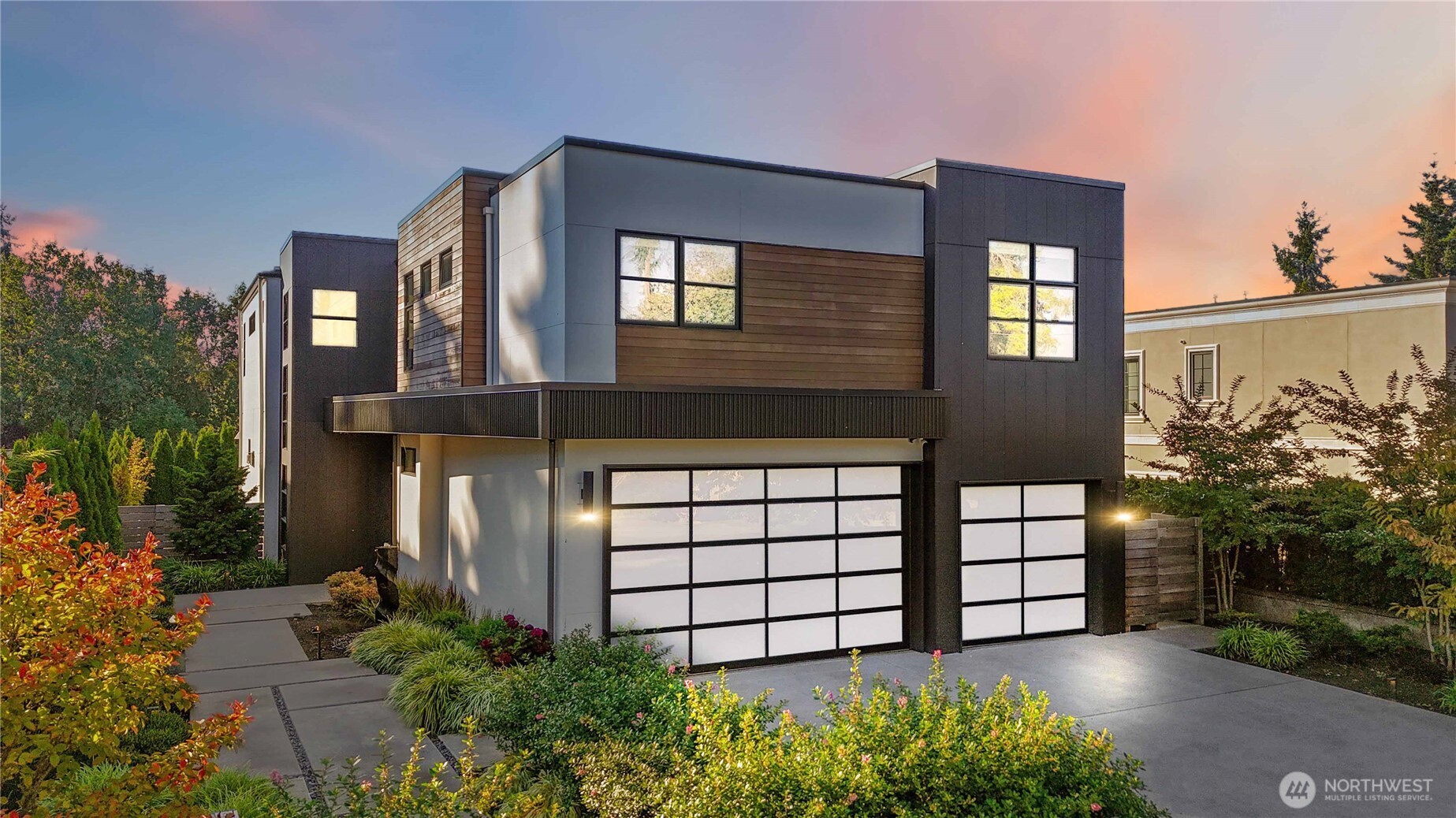 Custom-built by Bordner Construction in October 2022, this modern, minimalistic home blends luxury and comfort in Medina. A dramatic entry opens to light-filled living spaces with Lutron smart lighting and refined finishes throughout. The chef’s kitchen features custom cabinetry, quartz countertops, high-end appliances, and a butler’s pantry. The main level includes a bedroom that can also serve as an office. Upstairs, the owner’s suite offers a fireplace, balcony, dual closets, and spa bath. The lower level features a media room, wine cellar, and guest suite. Enjoy a flat backyard with covered patio, outdoor kitchen, and heaters—just minutes from Bellevue, dining, parks, and top-rated schools.