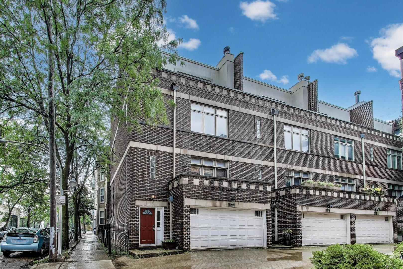 Beautifully refreshed 3-bed, 2.1-bath end-unit townhome with over 3,200 sq ft of light-filled luxury in the heart of Wicker Park and sought-after Pritzker School District. Nestled on a quiet, tree-lined courtyard street, this 4-level brick corner home impresses with soaring 12-ft ceilings, dramatic skylights, fresh paint, and refinished hardwood floors. The open-concept main level includes a cozy fireplace, integrated ceiling speakers, and a chef's kitchen with refinished cherry cabinets, granite counters, and SS appliances including Bosch dishwasher. The oversized primary suite features a marble spa bath with steam shower, Jacuzzi tub, and dual vanities. Two additional bedrooms, a second full bath, and a finished lower level offer ample living and flex space. Multiple private outdoor areas include a freshly stained deck on each level and a fenced yard with grilling zone. Attached 2-car garage, updated lighting, and ceiling fans complete this turnkey home. Easy access to Blue Line, 606 Trail, shops, dining, and more!