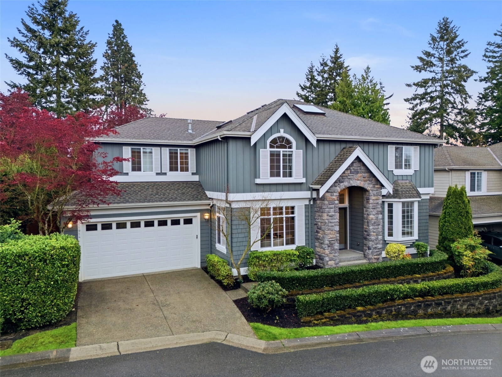 Rare southern Finn Hill opportunity—moments from open meadows, estate homes, and scenic Lake Washington and Mount Rainier viewpoints. Tucked on a quiet cul-de-sac in Finn Hill’s most sought-after southern enclave, this exceptional 4-bedroom, 2.5-bath home offers ~2,570 sq ft of refined, light-filled living. Thoughtfully designed and impeccably maintained, it features warm hardwoods, abundant natural light, and elegant, well-proportioned interiors that balance everyday comfort with elevated style. The open-concept kitchen and family room with fireplace create a seamless space for both relaxed living and effortless entertaining, while expansive windows invite in natural light and frame serene territorial views. Upstairs, the primary suite is a peaceful retreat with spa-like ambiance and a peekaboo Lake Washington view. Additional bedrooms offer flexibility for guests, offices, or evolving lifestyle needs. Low-maintenance grounds provide privacy and ease, complemented by a two-car garage and ample storage. A rare opportunity for expansion awaits below, where a substantial unfinished lower level offers exceptional potential to create additional living space tailored to your vision, unlocking meaningful long-term value. Located in one of Kirkland’s most desirable neighborhoods, this home delivers the feel of nearby estate living in a more efficient, livable footprint—just minutes from parks, beaches, top-rated schools, and Eastside tech hubs.