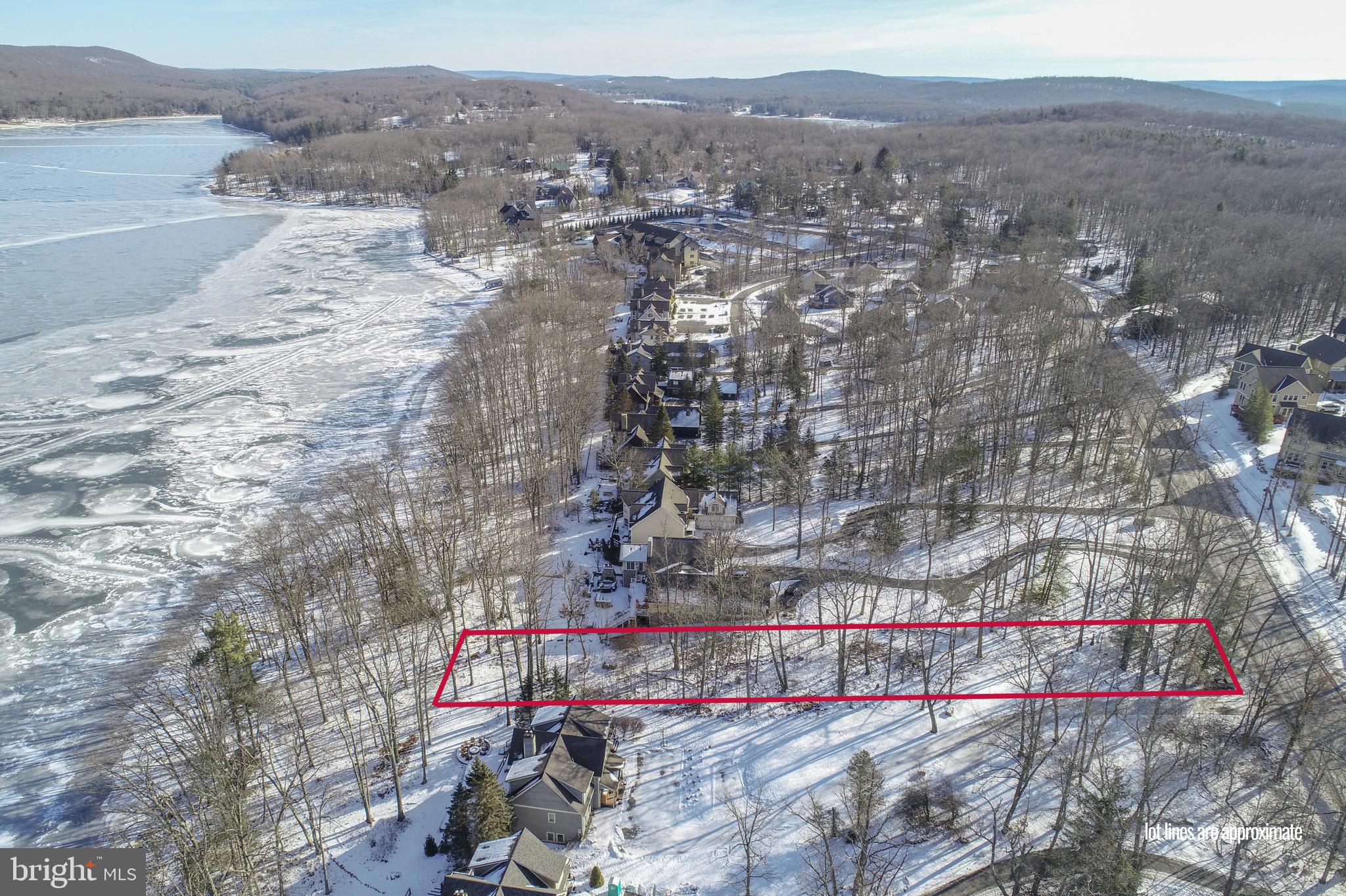 RARE OPPURTUNITY! Discover one of the final opportunities to own true lakefront on the iconic Glendale Road! This premier homesite offers approximately 75 feet of pristine Deep Creek Lake frontage in a serene no wake zone, perfect for swimming, kayaking, and peaceful lakeside enjoyment. Zoning in this area is Town Center. This allows for a larger building area within the lot with relaxed setbacks.The property includes one dedicated slip on a small 3-slip community dock, providing easy lake access without the upkeep of private dock ownership. Located in the heart of one of Deep Creek’s most desirable rental and recreational areas, this location is proven to perform — surrounding properties consistently gross between $150K–$200K annually as short-term rentals, making this an ideal build site for both personal use and investment.Just minutes from DCL’s favorite hotspots — Honi-Honi, Arrowhead Market, Firewater Kitchen & Bar, Dutch’s at Silver Tree, Deep Creek Lake State Park and Wisp Resort — plus marinas, shopping, and more.Whether you envision a modern vacation home, a luxury rental retreat, or a legacy lakefront getaway, this rare Glendale Road lot delivers exceptional location, strong rental potential, and the lake lifestyle everyone wants. Opportunities like this are nearly gone — don’t miss your chance!