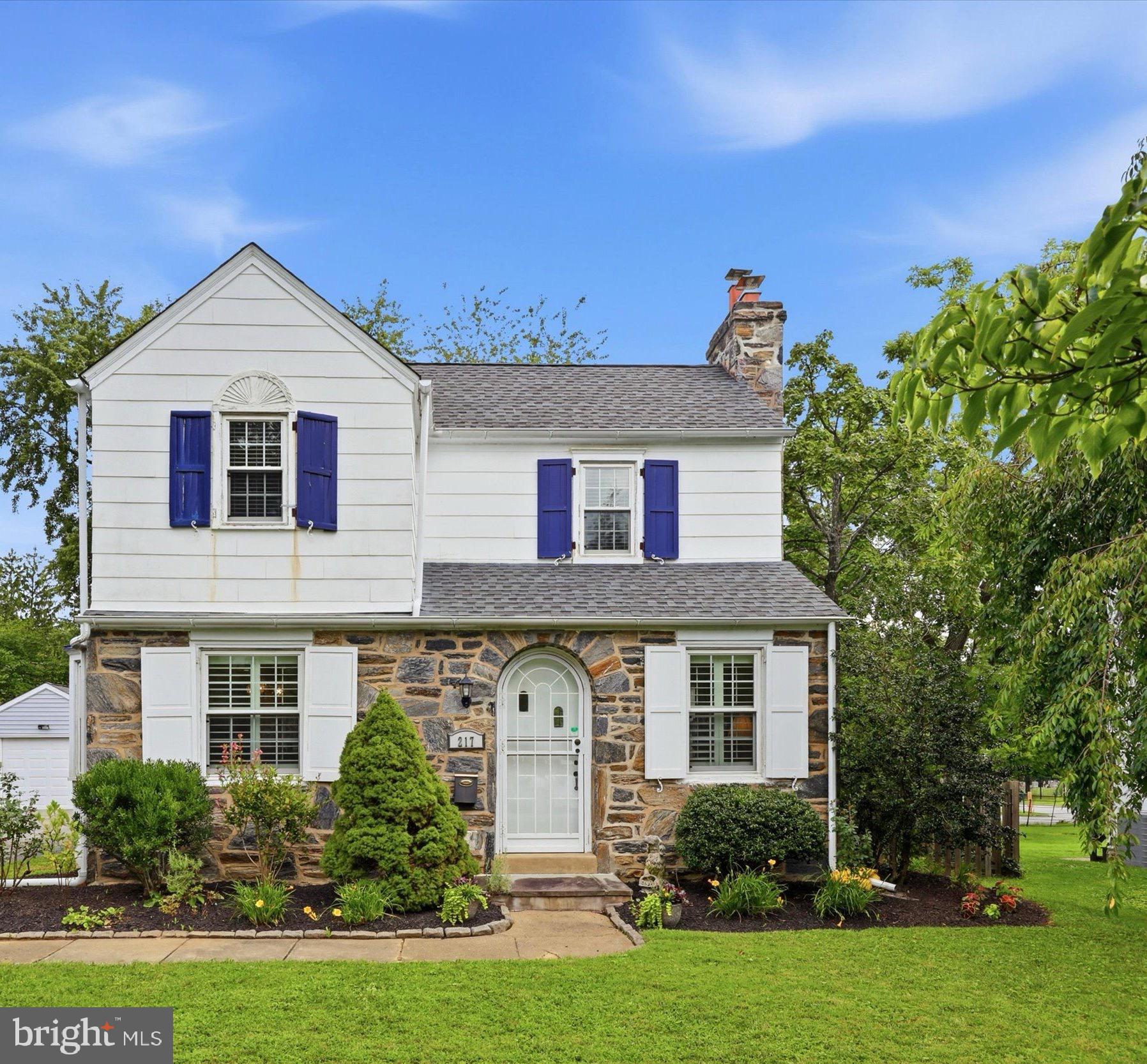 A Tastefully updated and well cared for home, located on a quiet street within walking distance to Ardmore's Restaurants, Night Life, Shops, Parks and Train.  A bright, open floor plan and gleaming hardwood floors greet you as you enter this lovely home. The arched front doorway leads to the spacious living room with a cozy fireplace. The dining room features a bay window and opens to the renovated kitchen with granite counters, breakfast bar, and stainless steel appliances. The second floor includes three bedrooms and a newly renovated full hall bath with a stall shower. The  finished lower level, including a powder room, laundry and storage space, provides an additional 235+/- int. square feet.  Enjoy the spacious partially fenced in  backyard. There is a  one car attached garage and a one car Car-Port with a deck above.  Great location!