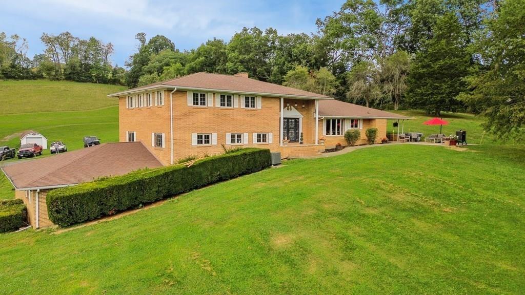 Sitting on a private 8.2 acre lot, this spacious property offers the prefect blend of comfort, space, and functionality. The home features 5 bedrooms and 2.5 baths, ideal for family living or hosting guest. An attached garage provides ever day convenience while a large barn and additional storage building offer ample room for equipment, hobbies, or livestock. Enjoy the peace and privacy of a secluded setting with plenty of room to roam, expand, or simply relax and take in the natural surroundings.