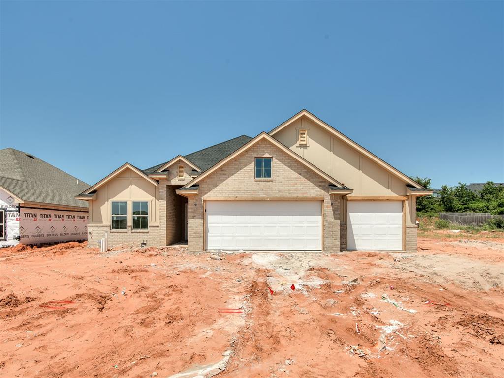 This home blends effortless elegance with practical comfort from the moment you step onto the covered front porch. Inside, the open concept living area centers around a designer fireplace and flows into a gourmet kitchen with a large island, custom cabinetry, high-end finishes, and a spacious walk-in pantry. The private primary suite features soft natural light, a ceiling fan, dual vanities, a soaking tub, a walk-in shower, ample linen storage, and a generous closet. Secondary bedrooms are well-appointed, and the guest bath includes a tiled tub-and-shower combo with elevated finishes. The large covered patio sets the stage for quiet mornings or evening gatherings. Backed by a 10-year structural warranty and additional manufacturer warranties, this home offers both style and peace of mind. Schedule your tour today!