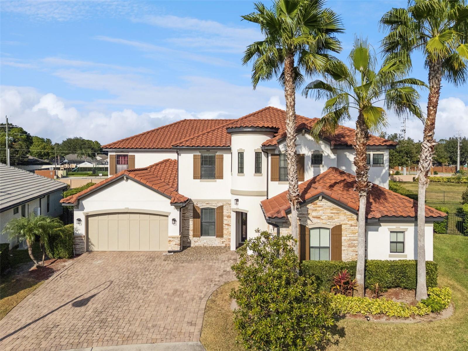 Under contract-accepting backup offers. Location! Location! Location! This 6-bedroom, 4.5 bath, luxury home spans over 5,000 sq. ft. of updated living space in one of Seminole County's most sought-after neighborhoods; The Preserve at Lake Sylvan. This small, close-knit neighborhood adds a sense of community that's rare to find. With four schools right behind the property (three private, one public) and six schools within a 2-mile radius, it is the perfect home for any lifestyle or family stage. It's also extremely close to grocery shopping, movie theater, restaurants, and more, as Colonial Town Park is less than 2 miles away. From the moment you walk in, you'll feel right at home as this home reflects modern luxury with neutral tones that complement any decor style. The inviting home office with French doors and custom shelving offers the perfect work-from-home setup. The formal dining room is ideal for dinner parties, while the chef-inspired kitchen will make you fall in love with cooking again-featuring quartz countertops, Zellige-style backsplash, real wood cabinetry, and modern finishes throughout. Step outside to your private oasis, where you'll find a saltwater pool with a waterfall and free-flowing design that feels straight out of a resort. Natural oak look tile and luxury vinyl flooring flow through the home, complemented by touches of marble and porcelain for an elevated aesthetic. The living room's custom electric fireplace with a handcrafted mantle creates the ultimate cozy vibe. Two of the bedrooms, in addition to the primary suite, feature private ensuite baths, offering flexibility and privacy for family or guests. This home is perfect for multi-generational living! Upstairs, the fun continues with a theater room and a full wet bar in the loft, for entertaining or unwinding after a long day. With all the amenities in this home, you'd never have to leave! From date night to game night to an all-out pool party, this home has all the vibes. And here's the best part: this show-stopping home is priced below appraised value, taking all the guesswork out of buying. All that's missing is you. Pack your bags and step into your dream home.