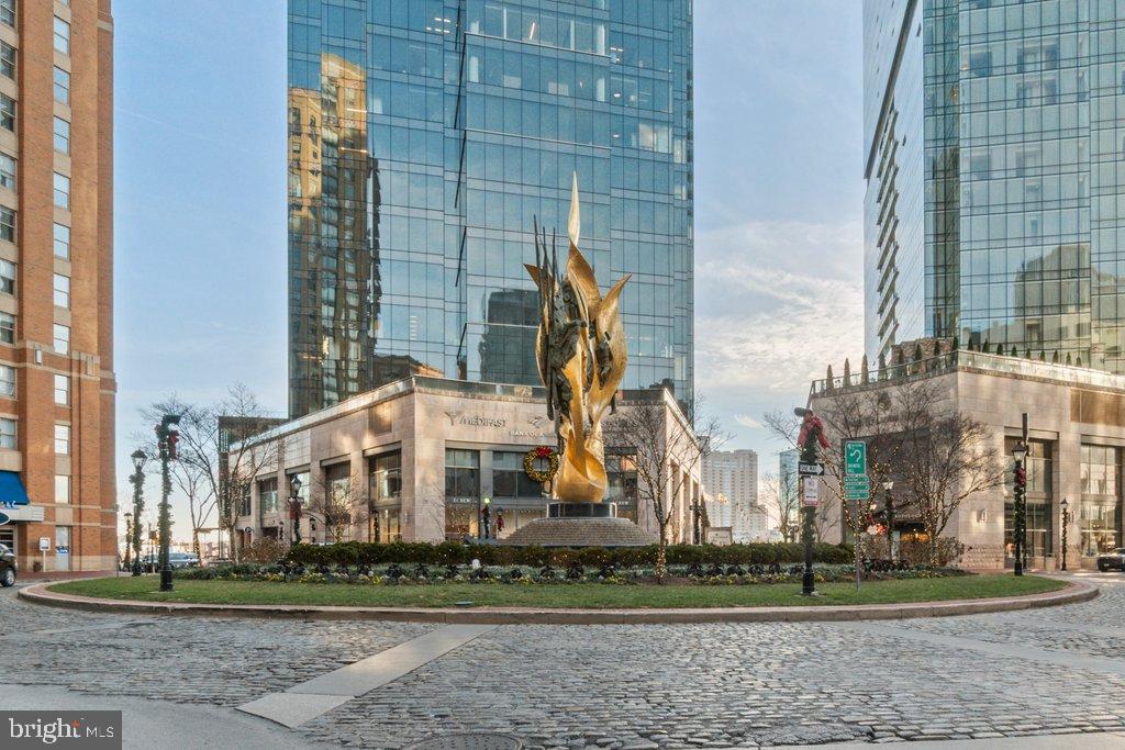 Rarely available 1 BR 1 BA condominium located in The Vue. This light-filled residence features breathtaking water views, floor-to-ceiling windows, Gourmet Kitchen, hardwood flooring, and spacious Master Suite with spa bath. An open concept floor plan with new hardwood floor and fresh paint. One deeded parking space and luxury building amenities—building security, concierge, secure package delivery, common sitting areas, grassy area dog park, EV charging, bike racks, and direct building access to the Harbor East Cinemas  &  MAC Gym (separate membership required). Enjoy living in Baltimore's hottest neighborhood: steps from the finest restaurants, promenade & Water Taxi, Whole Foods, Starbucks, & boutique shopping.