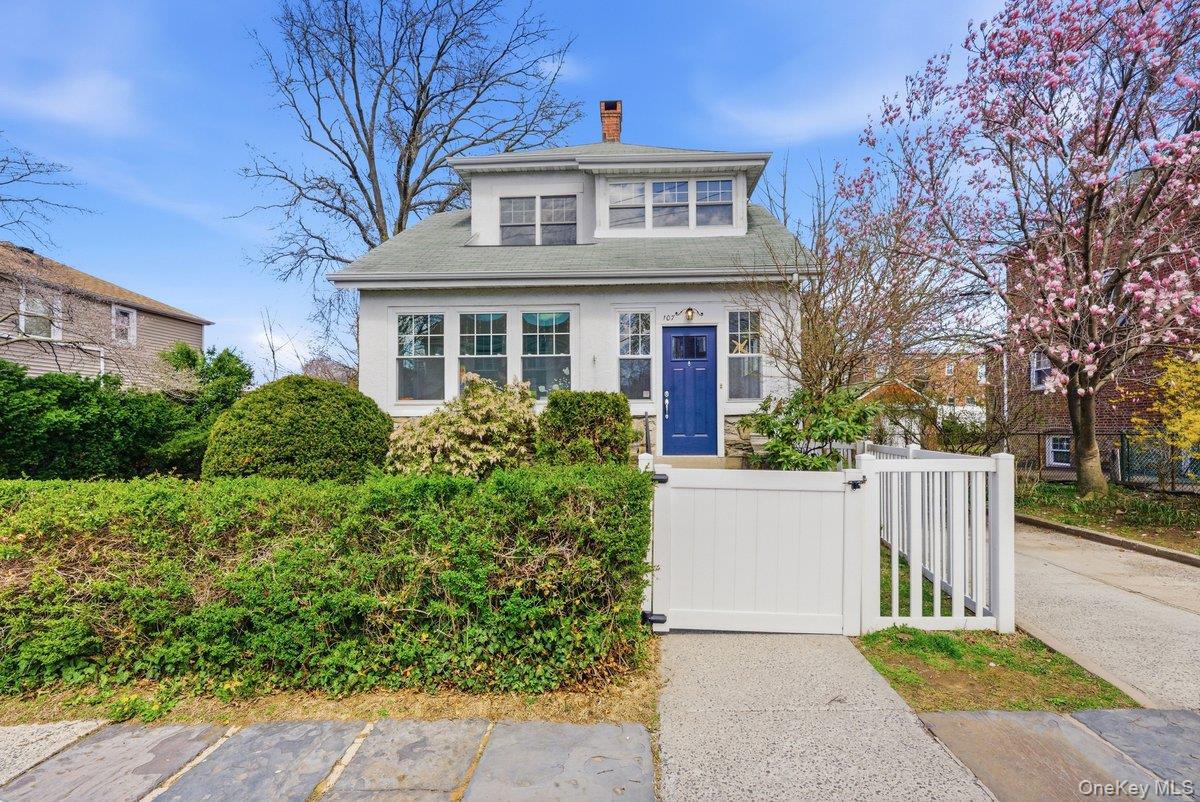 Welcome to this exquisite and stunning 3-bedroom, 2.5-bath Colonial, gracefully set on an expansive 75 x 100 property in the heart of Yonkers, just 25 minutes from Manhattan. This sun-drenched home showcases unparalleled beauty, blending timeless charm with modern luxury at every turn. Step into a welcoming sunroom that flows effortlessly into the elegant entry foyer, leading to a warm and inviting living room highlighted by a classic wood-burning fireplace. The formal dining room, complete with sliding glass doors to the deck, is perfect for hosting gatherings, while a beautifully designed powder room adds convenience. The first floor is completed by a chef’s custom kitchen featuring sleek quartz countertops, abundant cabinetry, and generous workspace—ideal for any culinary enthusiast. Upstairs, this pristine home offers a spacious primary bedroom with ample closet space, along with two generously sized bedrooms and a luxurious hall bathroom designed with comfort and style in mind. The finished lower level, with its own private entrance, provides exceptional versatility—perfect for extended relatives, a recreations room, or a home office—along with a full bathroom, laundry area, and additional storage. The true highlight of this home is the breathtaking backyard retreat—your very own private sanctuary. This outdoor oasis is thoughtfully designed for relaxation and gatherings alike, featuring a spacious Trex deck that sets the stage for unforgettable summer evenings, weekend barbecues, and peaceful mornings with coffee in hand. Surrounded by lush greenery, it’s a cozy escape that feels worlds away. Truly a commuters dream- minutes from buses, trains, shopping and steps from NYC. A rare opportunity to own a home that truly has it all—space, serenity, and sophistication in one exceptional setting!!!