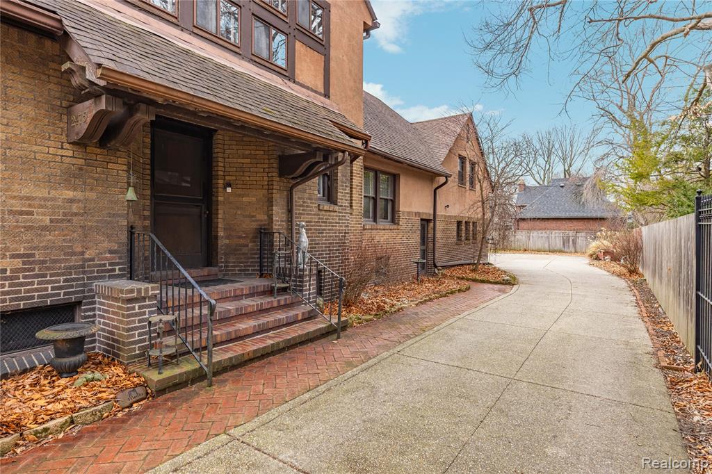 Amazing Historic Indian Village house designed by renowned Architect Leonard B. Willeke for the Hudson-Webber family. This stunning 6-7 BR Home has natural wood throughout, both floors and paneling. The Lg foyer has a Pewabic floor, as does the sunroom. Living room has one of the most amazing Pewabic fireplaces in Indian Village, plus built-ins, Pocket Doors leading to the sun room which also has a Pewabic fireplace. Lg dining room w/plaster crown moldings, leaded glass doors and built-ins, original chandelier and wall sconces. Substantial butler pantry w/ample storage, more built-ins and Chrysler-Koppen fridge. Lg kitchen waiting for new owners to decide how they would like to make it their own. Gracious staircase leads to the 2nd Floor which has a large primary bedroom w/ Pewabic fireplace and en suite bath. Two more lg bedrooms w/bath. 3rd Floor has 2 more lg bedrooms and full bath. Attached 2-car garage w/servants quarters above, w/1-2 Bedrooms and full bath. There are many original features, light fixtures, leaded glass windows and doors. Indoor storms on first floor. Updated breaker box, newer boiler (2016). Lg basement laundry room. Newer exposed aggregate driveway, newer backyard fence and wrought-iron driveway gate.This amazing arts-and-craft style house is one of a kind. Work is needed in some areas and this is reflected in the price. Home Warranty included. This house is shown by Appt. Only, POF/Pre-App needed Prior to all Showings. Please call agent if you have any questions. House is being sold as is. BATVAI