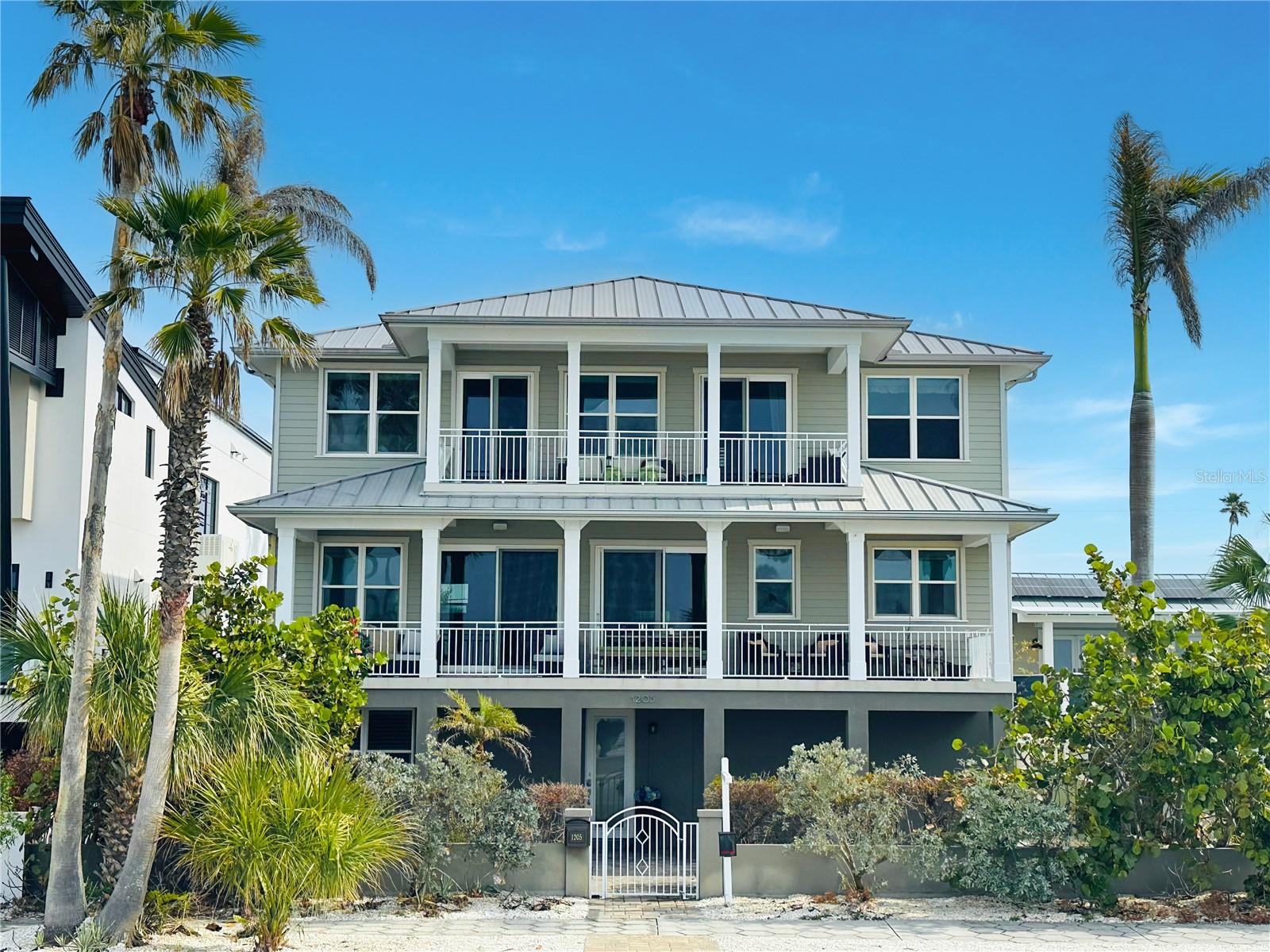 Gulf-Front Luxury in Pass-A-Grille – Breathtaking 180° Water Views!

Welcome to your dream beachfront retreat in the heart of Pass-A-Grille! This stunning furnished and turnkey three-story, 4-bedroom, 3-bath home offers unobstructed 180-degree views of the Gulf of Mexico and a rare blend of luxury, durability, and functionality.

Built in 2013 with solid block construction, this home boasts concrete decks on all levels, hurricane-rated windows and doors, hurricane clips on the roof, and water-resistant sheetrock (up to 5 ft) on the first floor—all ensuring peace of mind and superior storm protection.

The open-concept design is perfect for entertaining, with gulf-facing balconies providing front-row seats to breathtaking sunsets. The chef’s kitchen, fully equipped, seamlessly flows into the dining, sitting, and living room areas for an effortless coastal lifestyle.

An elevator shaft is already in place from the ground level to the third floor, offering buyers the option to install their own private elevator.

The ground-level bonus room offers endless possibilities—perfect for a home gym, yoga studio, office, or a stylish man/she cave. A garage door opens directly to a patio, making it ideal for a future poolside lounge.

With a 3-car garage, 6 vehicle driveway, fenced in property, and upcoming new gutters (scheduled for late February/early March), this home is truly move-in ready.

The oversized 6,686 sq ft lot has plenty of room for a buyer’s dream size pool, outdoor kitchen, grill station, and seating.

The home is just two beach blocks north of Pass-a-grille’s historic downtown, which offers over a dozen open businesses from restaurants, shops, bars, and boutique hotels. Merry Pier  located in downtown offers fishing and boat charters  to Shell Island, Fort Desoto, and Eggmont Key. 

Seven beach blocks north of the property enjoy a couple restaurants, bars, and Shaner’s meat and seafood market for easy local  grocery pick up.

Experience luxury coastal living in one of the most coveted locations on the Gulf Coast. Don’t miss your chance to own this exceptional beachfront haven!

The home is currently tenant occupied and under contract until December 2025. Rent is $8600 a month and tenants pay all utilities. 

Do not disturb tenants. Sellers agent to accompany all showings.