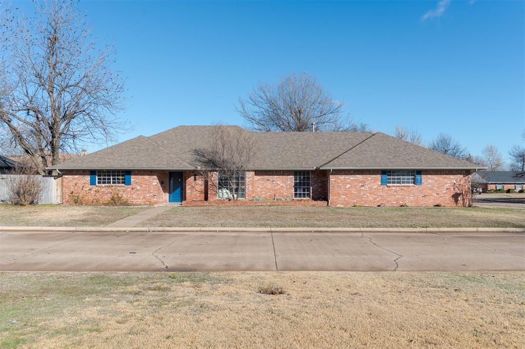 Beautifully renovated ranch-style home located on a sprawling corner lot! This stunning property is sunlit and airy, with two expansive living spaces providing optimal lounging and entertainment options. Built-in bookshelves flank the prominent wood burning fireplace - the perfect backdrop for cozy winter evenings. A large, dedicated formal dining room offers an elegant space for hosting dinner parties or events. The charming eat-in kitchen will surely be the heart of the home, with a lovely breakfast nook with built in china hutch providing a gathering space for all. The updated kitchen is equipped with sleek quartz countertops, stainless steel appliances, and a large pantry. Each spacious bedroom has an abundance of natural light and ample storage space. The primary suite is equipped with two large closets and en-suite bathroom! The home's unique split floor plan offers a rare opportunity for a private mother-in-law suite, home office, or guest quarters - with a large bedroom with en-suite separated from the main part of the home through the laundry area! With an attached two car garage, covered patio, and tree shaded backyard, this has everything you could want in a home!