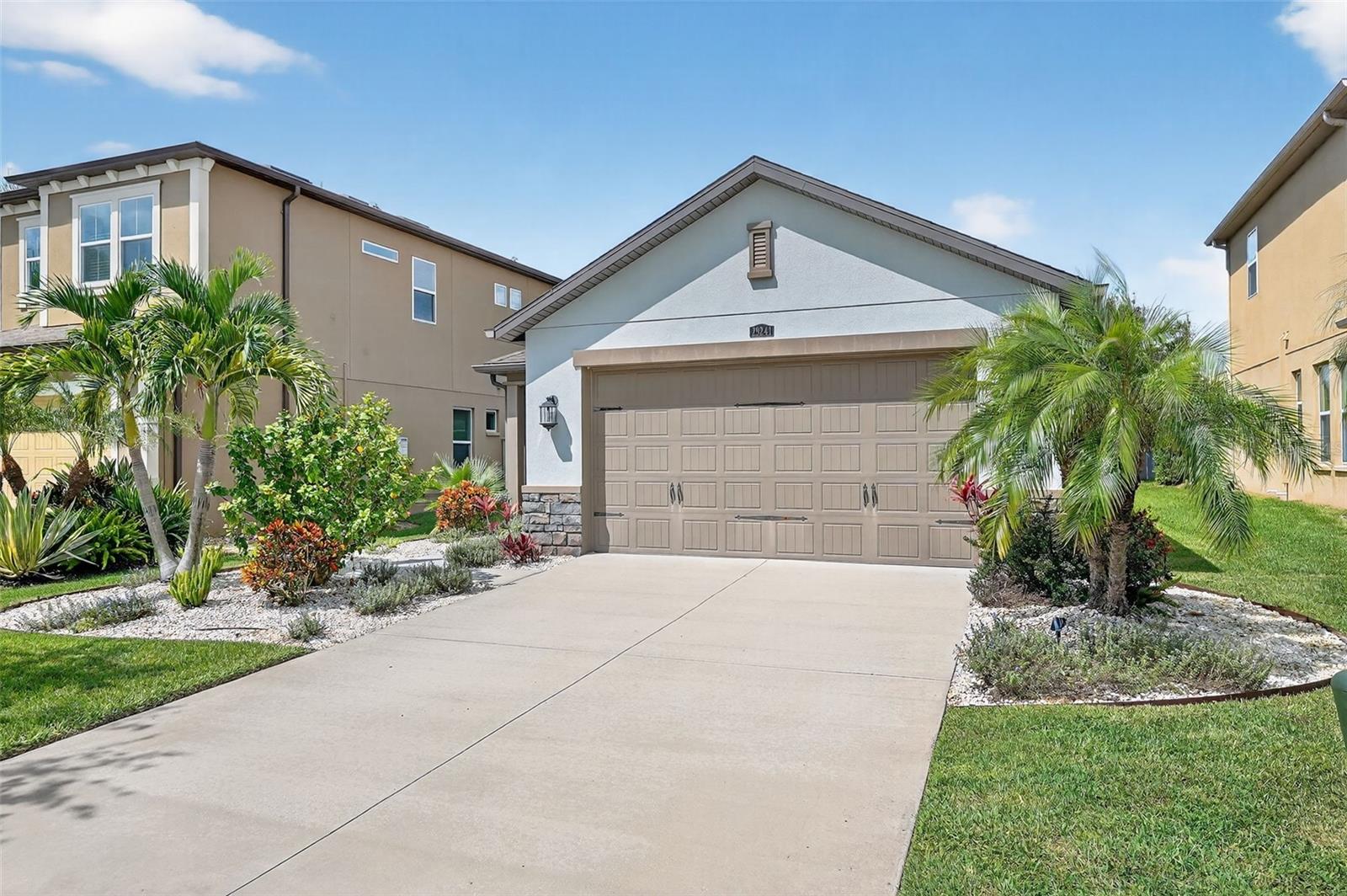 Priced to SELL!! Welcome Home to Estancia at Wiregrass 
Step inside and imagine your life unfolding in this beautiful 3-bedroom, 2-bathroom Standard Pacific home nestled in the heart of Wesley Chapel. From the moment you arrive, the glass door and stone exterior set the tone warm, elegant, and timeless.
As you walk through the door, the hidden foyer creates a sense of privacy, opening into a bright, open-concept living space. The kitchen is the heart of the home, with quartz countertops, 42-inch cabinets, a gorgeous backsplash, and stainless-steel appliances with a reverse osmosis water-softening system. Whether it’s preparing weeknight dinners or hosting friends around the central island, this space was designed to bring families and friends together.
The dining and great room flow seamlessly out to the screened-in patio your personal retreat where morning coffee feels peaceful, and evenings with loved ones feel like a celebration.
The split floor plan offers both comfort and privacy. The primary suite feels like a getaway with its tray ceiling, spa-inspired bathroom, oversized walk-in shower, and a closet designed to keep life organized. On the other side of the home, two spacious bedrooms share a full bathroom, making it perfect for family, guests, or even a home office.
Life in Estancia at Wiregrass is more than just owning a home it’s a lifestyle. Friendly neighborhood,Resort-style amenities await, including a 7,000 SF clubhouse with clubroom and meeting room, an aquatic center with zero-entry pool and lap lanes, shaded cabanas, pool with water slide, state-of-the-art fitness center, tennis courts, basketball courts, parks, playground, walking trails, and more! With a social director, your calendar can be as full as you’d like from community gatherings to seasonal events.
This property sits in the A-rated school zone of Wiregrass Ranch with easy access to the interstate, premier shopping & dining, and just minutes from downtown Tampa and Gulf Coast beaches. Convenience and Florida lifestyle living at its finest. Low HOA fee, No Flood Zone!
