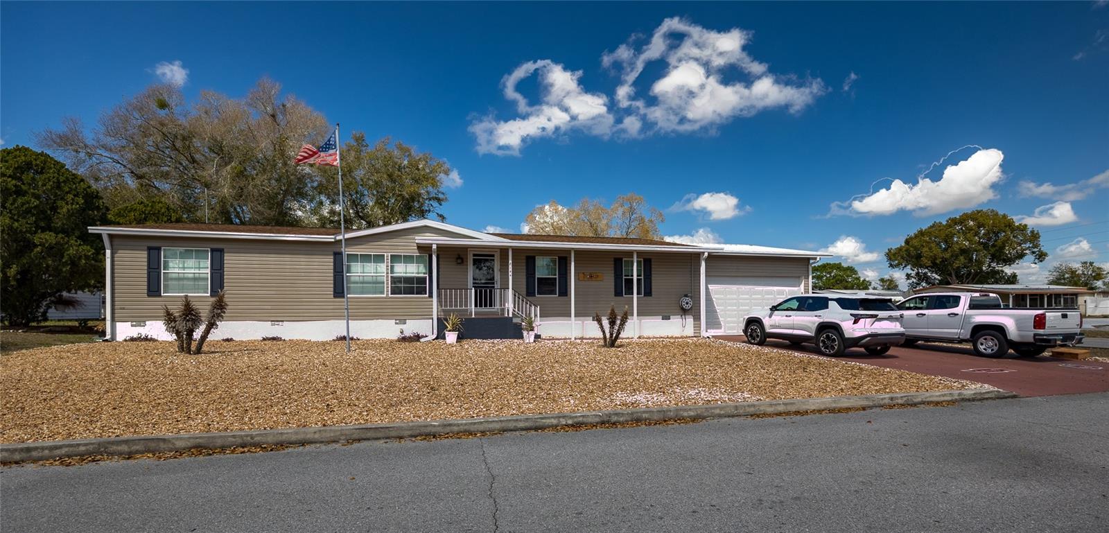 Enjoy unparalleled comfort and security in this pristine, [2002 ] manufactured home located in the desirable [Brookridge]. Boasting [nearly 1900] sq. ft. of living space, this home offers an open-concept design with high-end finishes throughout. The chef-inspired kitchen features stainless steel appliances, marvel countertops, and a large island perfect for entertaining. Retreat to the spacious primary suite  and a spa-inspired bath featuring a double vanity and walk-in closet and shower.Highlights:Newer manufactured home on your own lot.  No lot fees.Structure: Spacious 3BR/2BA, [Year] built, energy-efficient with].Upgrades: [2 years new Vinyl plank flooring throughout, attached 2-car garage, 3 year new roof,2 year new HVAC, 4 year new marble ktichen counter tops, 5 year old Spa, and carport is 4 years oldLive your best life in this move-in-ready, secure, and well maintained home. Schedule your private tour today—this gem won't last long!