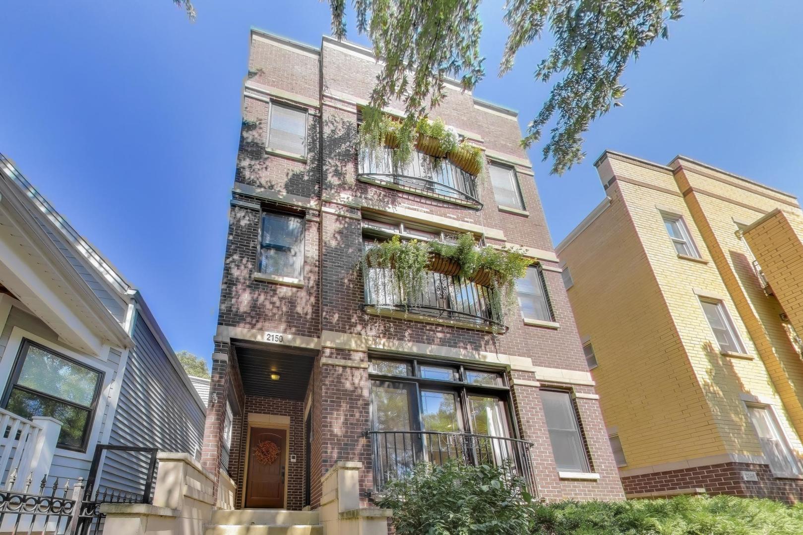 Stunning extra wide duplex near Wrigleyville, Roscoe Village,  North Center! Experience nearly 3,000 sq. ft. of luxurious living space across two levels in this beautifully appointed 4-bedroom, 3.1-bathroom home. The open-concept design showcases a gourmet kitchen with SubZero and Viking appliances, granite countertops, an island with breakfast bar, pendant lighting, and elegant glass-front cabinetry. A dry bar with wine fridge and custom cabinetry enhances the dining area, which flows seamlessly into the family room anchored by a cozy wood-burning fireplace. The primary suite is a private retreat with balcony access, walk-in closet, and a spa-inspired bath featuring Jacuzzi tub, rain shower with glass enclosure, dual vanity, and marble tile work. The spacious lower level offers a living room with gas fireplace, a 3rd full bathroom, a second en-suite with steam shower and walk-in closet, a 4th bedroom/office with French doors, and a laundry room with front-load washer/dryer and storage. WOW. Finishes & features: Hardwood floors, crown molding, recessed lighting, and ceiling fans.   Fresh white paint throughout for a clean, modern look. Tall ceilings. Gated building entry, detached garage parking, and fenced yard. Enjoy this prime location near Hamlin Park, Lane Tech, the Addison Brown Line, Kennedy Expressway, and endless restaurants, coffee shops, and nightlife. This home truly lives like a single-family residence-don't miss your chance to see it today!