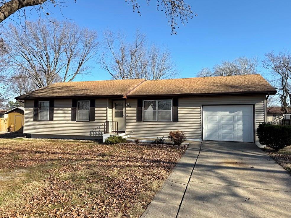 Southside Home for Sale in El Dorado Springs, MO. Schedule a showing soon to see this 3 bedroom, 1 bathroom starter home on the southside of El Dorado Springs, MO. This 1,054 sq ft home offers low-maintenance, charming curb appeal with the vinyl sided home with shutter accents. The home features a large living room. Then kitchen/dining combo offers a small bar for dining or additional countertop space as well as a pantry closet for additional storage. An electric range and vent hood are sold with the home. The window over the kitchen sink gives a nice view of the open backyard that features a 9’x18’ concrete patio perfect for shaded summer evenings. The home features a newer HVAC & water heater. The one car attached garage gives convenient parking and the tool shed out back provides great outdoor storage. Nice condition homes in this price range are difficult to find, so call soon!