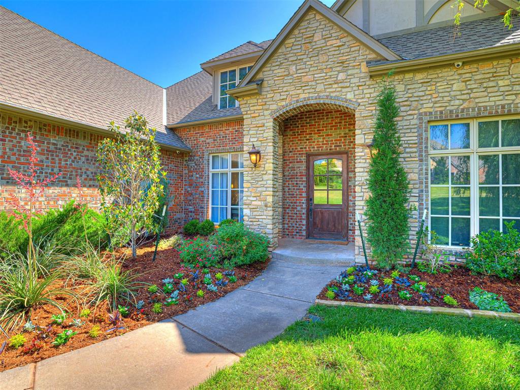 Tucked beneath mature trees in established Hunters Creek, this exceptional Edmond home delivers the space, flexibility and resort-style outdoor living buyers are searching for. The showpiece backyard has been completely transformed with a custom pool, spa, water feature, splash pad, generous entertaining areas and a fully equipped outdoor kitchen and bar with a grill, refrigerator and fireplace.Inside, the 4-bedroom, 4.5-bath floor plan offers 4,434 square feet designed for both everyday living and memorable gatherings. Three bedrooms are conveniently located on the main level, while the upstairs bedroom, full bath and oversized bonus room create an ideal private retreat for guests, hobbies or additional living space. A spacious remodeled office provides a true work-from-home destination.The kitchen opens naturally to the large family room, where a dramatic floor-to-ceiling stone fireplace anchors the space. A walk-through coffee bar, generous pantry, formal dining room and flexible second living area make entertaining effortless. The private primary suite features a spacious bath and separate closets.With multiple living areas, exceptional bedroom separation and one of the neighborhood’s most impressive outdoor retreats, this home offers the freedom to work, gather, entertain and unwind—all in a sought-after Edmond location near shopping, dining and Edmond schools.