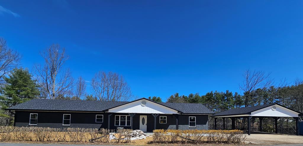 Don't miss this incredible opportunity to own a beautifully remodeled 3-bedroom, 3-bath brick ranch set on 3 scenic acres just moments from the New River and the New River Trail—nice place for outdoor enthusiasts, nature lovers, or anyone seeking peaceful country living with convenience. This home has been thoughtfully and extensively updated and is nearing completion, featuring a brand-new roof, electrical, plumbing, energy-efficient windows, heat pump, and gutters for worry-free living. Relax and unwind on the  timber frame front porch or entertain guests on the new back deck overlooking your private acreage. Inside, you'll love the bright open floor plan with gorgeous hardwood floors throughout, a completely redesigned kitchen that will be finished with granite countertops and brand-new appliances, and a large master suite and bath. A full unfinished basement provides endless possibilities for storage, a workshop, or future expansion. The property also includes a detached 2-car carport and plenty of space to enjoy the outdoors. With modern upgrades, classic charm, and a location close to recreation and amenities, this home truly has it all. Interior photos coming soon—schedule your showing early before it's gone!