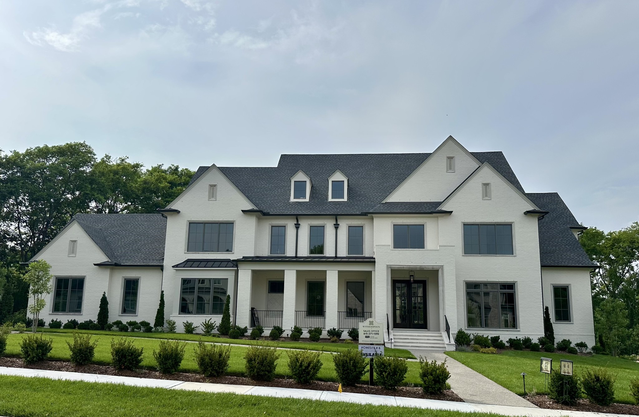 Ford Classic Homes presents luxury living in Brentwood’s sought-after Witherspoon community! This home offers a grand two-story foyer, soaring 18-ft ceilings with wood beam accents in the great room, and oversized windows for abundant natural light. The open-concept layout includes a formal dining room, wine room, butler’s pantry, and a chef’s kitchen overlooking the spacious great room and breakfast area. Enjoy the private study with French doors, a covered outdoor living space with fireplace and grill, a primary and main-level guest suite. The elegant primary suite features a spa-style bath with freestanding tub, large shower, and dual closets.  Upstairs boasts a bonus room with wet bar, exercise room, and finished storage. Elevator, 4-car garage, and rear staircase add function to style.  5 Beds | 5 Full + 2 Half Baths | Elevator | 4-Car Garage | Tree-Lined Backyard  Final opportunity to own new construction in one of Brentwood’s premier neighborhoods!