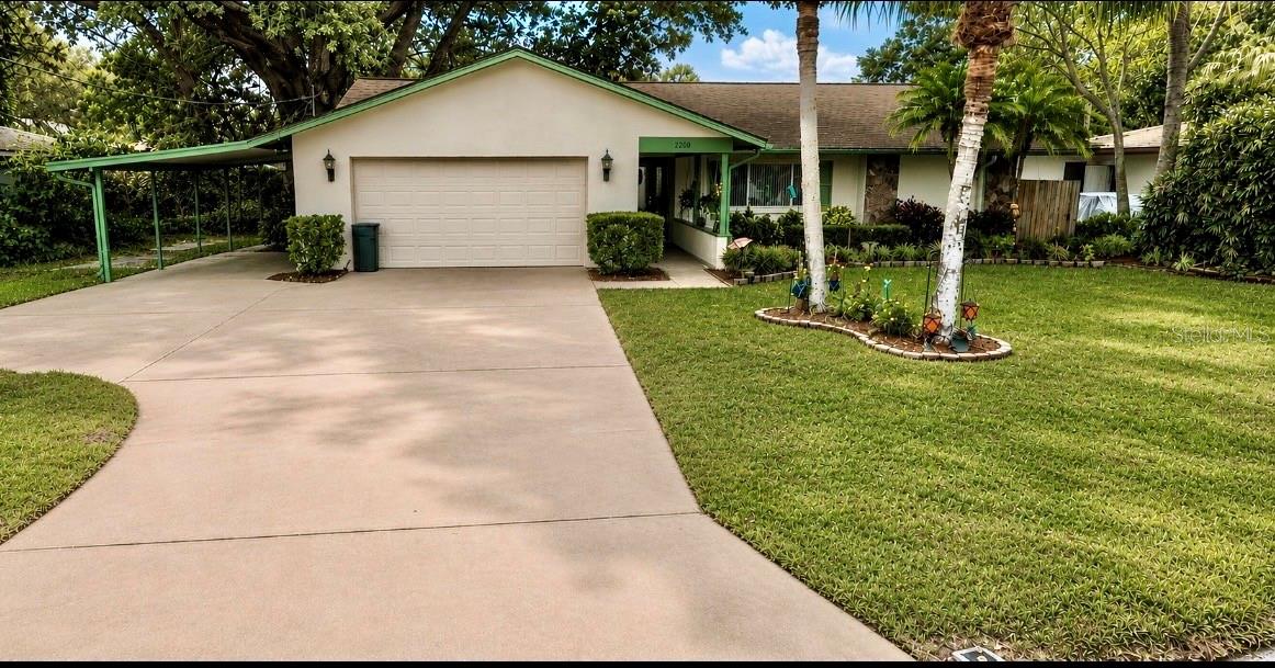 LOWEST PRICED 2 car garage home with over 2000 SQ ft in Clearwater!!! Welcome to this 3-bedroom, 2-bath block home located in the highly desirable Largo/Clearwater area of Pinellas County! Located on a deadend street with no through traffic to contend with. From the moment you arrive, you’ll immediately notice the pride of ownership reflected throughout this exceptional property, featuring newer windows and doors for added comfort, efficiency, and peace of mind. One of the home’s most captivating features is the peaceful front-facing pond view, creating a serene natural backdrop filled with beautiful wildlife to enjoy year-round. Step through the elegant front entry into a spacious and thoughtfully designed interior offering both a formal living room and a separate family room, creating the perfect blend of comfort, functionality, and flexibility for everyday living or entertaining guests. The inviting kitchen and adjoining dinette area provide a warm gathering space and feature quality cabinetry along with beautiful Corian countertops as part of the kitchen and bathroom updates completed just a few years ago. This home offers a highly desirable split-bedroom floor plan designed with both privacy and convenience in mind. The oversized primary suite is privately situated on one side of the home and easily accommodates large king-size furniture while featuring a spacious walk-in closet and a beautifully updated primary bathroom complete with double vanity sinks. The two additional bedrooms and guest bathroom are located on the opposite side of the home, making this layout ideal for family members, guests, or multi-generational living. An enclosed newer addition offers endless possibilities and can easily serve as a home office, hobby room, fitness area, or additional living space tailored to your needs. Step outside to the screened lanai where you can relax, entertain, and enjoy Florida’s beautiful weather year-round. Additional highlights include an inside laundry room, a spacious 2-car garage with a dedicated workshop area, and a prime location convenient to A zoned schools, shopping, dining, world-famous beaches, and all the incredible amenities Pinellas County has to offer. Priced to sell and ready for a quick closing, this exceptional home combines comfort, space, privacy, and location into one incredible opportunity. Schedule your private showing today and bring your offers before this one is gone!