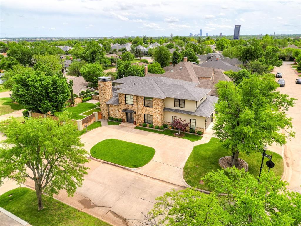 This Modern Nichols Hills residence was built in 2014 and is located just a few blocks from desirable landmarks such as Kite Park, the Grand Blvd walking trails and Nichols Hills Plaza.  The open floor plan is perfect for entertaining while offering inviting spaces for relaxed family living.  The kitchen features a top of the line Dacor Quad refrigerator/freezer, double ovens and a large island with ice maker.  The expansive primary suite has dual closets, a spacious bathroom and a soothing steam shower.  Upstairs you will find three bedrooms, three bathrooms, an office and a huge gameroom, perfect for gathering friends and family.  Other sought after upgrades include a generator, a three car garage with an above ground storm shelter and a water softener.  Come see this comfortable and move in ready home today!