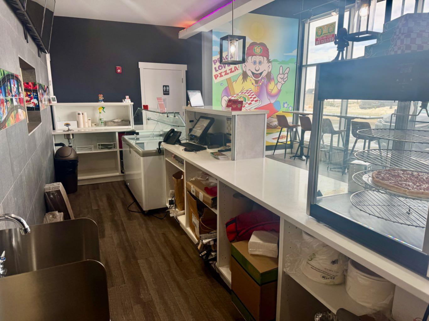 Exceptional opportunity to acquire a well-established food business in the rapidly growing city of Airdrie. The existing food concept can be changed to suit your vision, subject to landlord and condominium board approval. Currently operating as a franchised pizza restaurant, the premises feature a versatile build-out that can accommodate a wide range of food concepts.This fully turnkey operation comes equipped with all necessary equipment and is successfully operating with a recognized brand and loyal customer base. Ideally situated in a high-traffic location with excellent visibility and ample on-site parking, the business benefits from strong walk-in traffic, particularly during lunch hours, due to its proximity to the Fortis Alberta office building and its large workforce.Known for its quality menu, efficient operating systems and consistent performance, this business offers a seamless transition for a new owner. The sale includes all equipment and fixtures. Inventory is extra and will be added to the purchase price at closing.An excellent opportunity for an owner-operator or investor seeking a ready-to-operate food service business in a thriving market. The listing price is for the business assets only and does not include real estate. The landlord is flexible and willing to negotiate lease terms with a qualified purchaser. A new lease agreement can be structured to accommodate the buyer's requirements, subject to mutual agreement and landlord approval.Please do not approach staff directly. All showings are strictly by appointment only.
