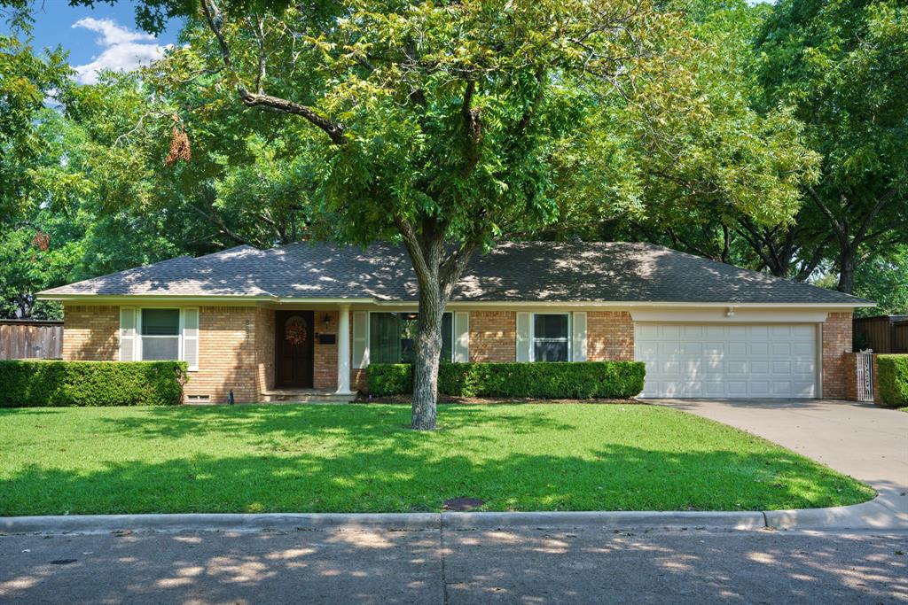 This beautifully maintained single-story home on a third-acre lot offers hardwood floors throughout most of the space, two generously sized bedrooms, and two full bathrooms. The light-filled family room features a cozy fireplace and tranquil views of the private backyard, while the kitchen shines with granite countertops, a gas range, skylight, bar seating, and an open flow to both the family room and formal dining—ideal for everyday living and entertaining. A spacious laundry-mudroom provides extra storage and connects to the two-car garage. Step outside to a serene backyard oasis with a stone patio, Hot Tub, pergola, towering pecan trees, and a storage building. A hidden gem in the charming alcove of Emerald Isle, this home is just steps from White Rock Lake and scenic Lawther Lane. Surrounded by mature trees and directly connected to more than nine miles of trails for walking, jogging, and biking—including the Santa Fe Trail to downtown and the Farmer’s Market—this location offers an unmatched lifestyle. Take in sunsets over the lake and panoramic views of the Dallas skyline from nearby Winfrey Point or walk just one block to the Dallas Arboretum for seasonal gardens and live concerts. Wine bars and restaurants are a short stroll away, with quick access to I-30, Buckner, and Northwest Highway. This is more than a home—it’s a lifestyle rooted in nature, community, and convenience.