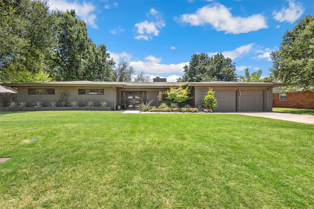 Mid-Century Modern and Fully Renovated! This beautifully reimagined Mid-Century home blends timeless architecture with modern updates. Inside, parquet wood floors flow through the open living and dining spaces, anchored by an authentic double-sided fireplace and built-in dry bar. Original mid-century light fixtures add character, while Pella windows and sliders fill the home with natural light.
The spacious primary suite features a built-in bed, a luxurious bathroom, and a custom closet. Updates include a new electrical panel, LED lighting throughout, and an upgraded HVAC system relocated overhead.
Step outside to a huge backyard designed for entertaining, complete with a pergola and storage shed. Every detail—from the authentic finishes to the thoughtful renovations—makes this home a rare find for lovers of Mid-Century style with today’s comforts.