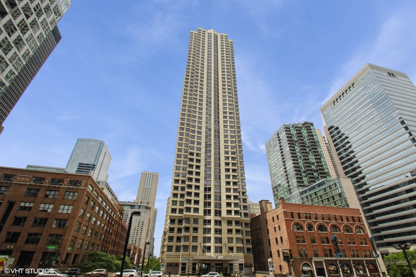 Welcome to exceptional downtown living in this spacious 1-bedroom, 1-bath corner unit situated in Chicago's dynamic and thriving River North neighborhood. Upon entry, venture to the right to find the generously sized bedroom with Elfa shelving surround in the bedroom closet. The full bath features a shower/tub combo, an extended vanity counter, and additional storage. Move on to the fully equipped kitchen, offering a white refrigerator/freezer, oven/stove, dishwasher, space-saving built-in microwave, and a pass-through window with a counter for extra dining space on your left. Continue forward into the impressive living and dining room combination flooded with natural light thanks to floor-to-ceiling windows that frame stunning south and west-facing views of the Chicago River and the iconic city skyline. Enjoy panoramic vistas of some of the city's most celebrated architectural landmarks, all from the privacy of your own home. One deeded garage parking space is available for an additional $25,000. What's more, this meticulously maintained full-amenity building offers 24-hour door staff, an indoor pool, sundeck, fitness center, theater room, conference room, and party room-perfect for entertaining and everyday convenience. All this, just blocks from public transportation, the Riverwalk, premier dining, nightlife, shopping, and more.