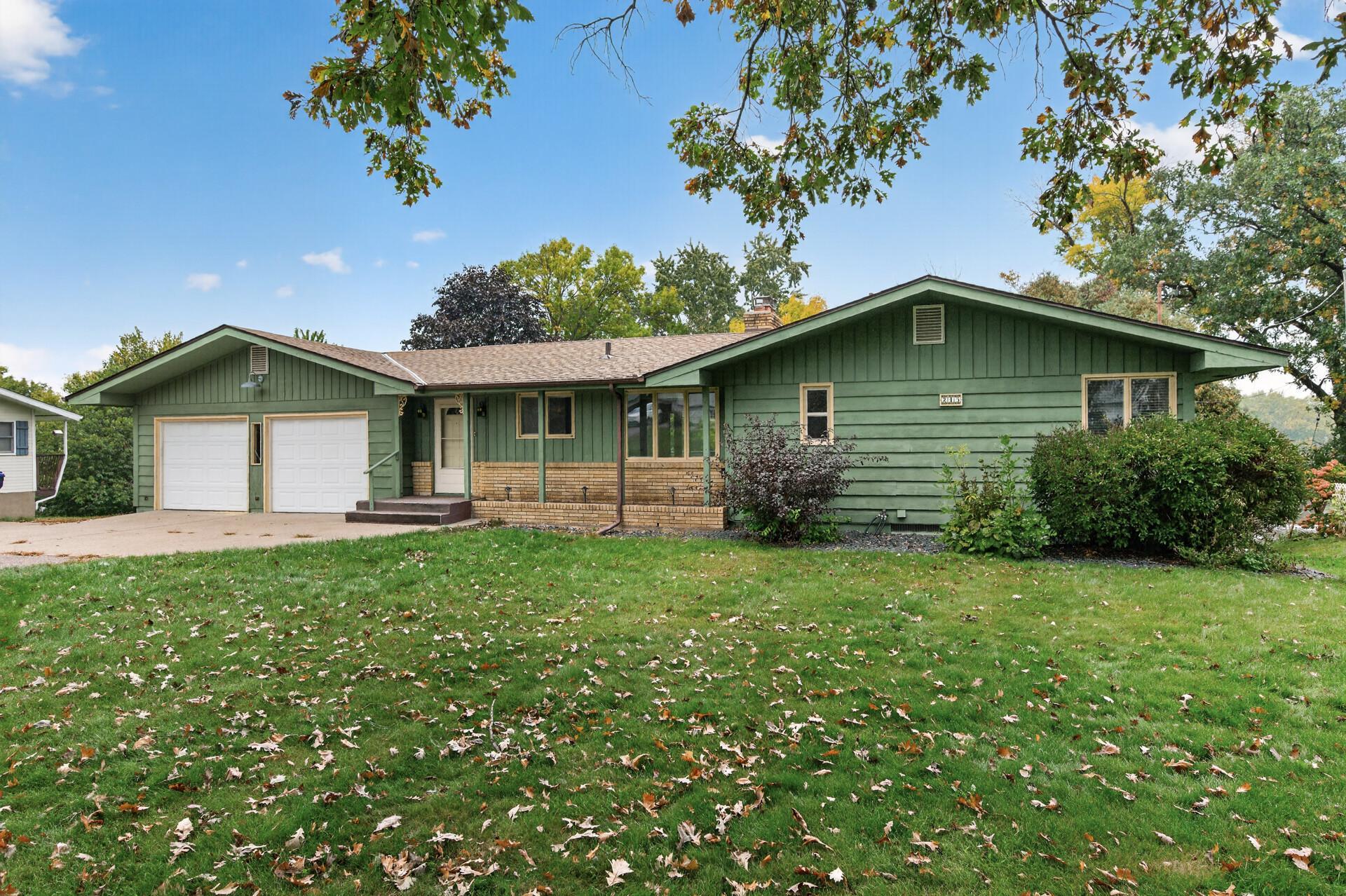 Welcome to life on the Mississippi! Set along the river in Monticello, this home offers a front-row seat to one of Minnesota's most beautiful natural settings. From the large living room picture window, four-season porch, and library, enjoy peaceful river views and watch swans, ducks, geese, and other wildlife make their way along the water.The home itself is ready for its next chapter. While some finishes reflect an earlier era, the spaces, setting, and views provide a wonderful opportunity to bring your own ideas and style to a home in a location that simply can't be recreated. An added bonus is the second full kitchen in the lower level, providing wonderful flexibility for entertaining, hosting extended family or overnight guests, or simply enjoying the convenience of a second gathering space. PLUS, you'll also find a heated shop for the person who loves to tinker or garden!Imagine morning coffee overlooking the river, quiet evenings in the four-season porch, or curling up with a book while watching the seasons change outside your window. And while the setting feels peaceful and tucked away, you're still conveniently located with easy access to major roads, shopping, dining, and everything Monticello has to offer.If you've been searching for a riverfront property with character, versatility, beautiful views, and the opportunity to make it your own, 245 Mississippi Drive is ready for you.