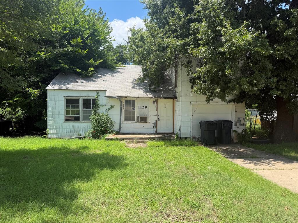 This one and a half-story home is being sold strictly as-is, with the buyer's right to inspect before closing. It's a solid candidate for an investor or someone comfortable rolling up their sleeves — "fixer-upper" is putting it mildly, so come in with realistic expectations and a contractor's eye rather than a move-in-ready mindset. For the right buyer — someone looking to renovate, flip, or add to a rental portfolio — this could represent solid upside once cleaned up and modernized. Priced and positioned accordingly.