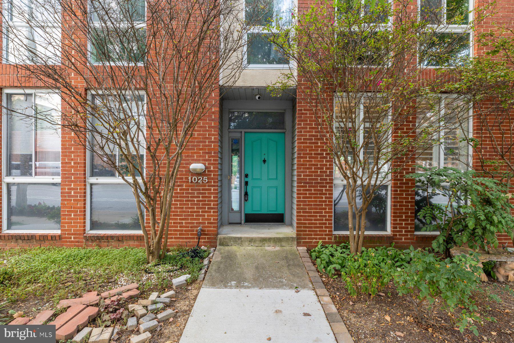 Nestled in the prestigious Federal Hill Historic District, this beautifully maintained Colonial townhouse offers a sophisticated blend of classic charm and modern comfort. With approximately 2,000 square feet of thoughtfully designed living space, this exceptional residence features an inviting open floor plan that seamlessly connects the living and dining areas—ideal for both everyday living and entertaining. Rich wood flooring and abundant natural light create a warm and welcoming atmosphere throughout the main living spaces. The gourmet kitchen is thoughtfully appointed with high-end appliances, including a gas range/oven, refrigerator, and dishwasher, providing both style and functionality. The adjacent dining area offers the perfect setting for intimate dinners or gatherings with family and friends. Upstairs, the spacious primary suite provides a private retreat, complete with a luxurious primary bath featuring an inviting soaking tub—perfect for relaxing at the end of the day. Two additional generously sized bedrooms offer comfortable accommodations for family, guests, or a home office. A host of features provide added comfort, security, and convenience, including an electric alarm system, fire detection system, motion detectors, and an indoor sprinkler system.Parking is a rare and valuable amenity in Federal Hill. The property includes an attached two-car garage, a double-wide driveway. You can enjoy all that Federal Hill has to offer. Ideally situated within walking distance of boutique shops, acclaimed restaurants, parks, and neighborhood amenities, this home combines the best of historic charm and convenient urban living.This exceptional Federal Hill residence offers the space, style, parking, and location you've been looking for. Don't miss the opportunity to make it your own.