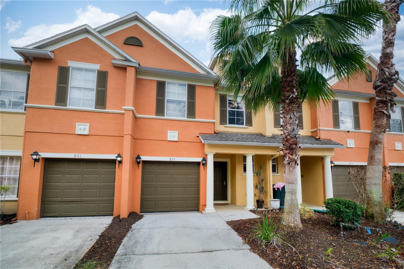 Perfectly situated townhome just under 20 minutes from Walt Disney World Resort and about 30 minutes to Orlando International Airport and Universal Studios Florida, offering unbeatable convenience for both living and investing. This move-in ready home features a well-designed layout with a spacious primary suite and a private attached patio—perfect for relaxing after a long day. Major updates include a 2023 A/C, giving you peace of mind from day one. Whether you're searching for a primary residence, vacation getaway, or income-producing short- or long-term rental, this property checks every box. Enjoy access to multiple community amenities including a pool, fitness center, and pickleball courts, adding even more value to this incredible opportunity. Don’t miss your chance to own in one of Central Florida’s most desirable locations!