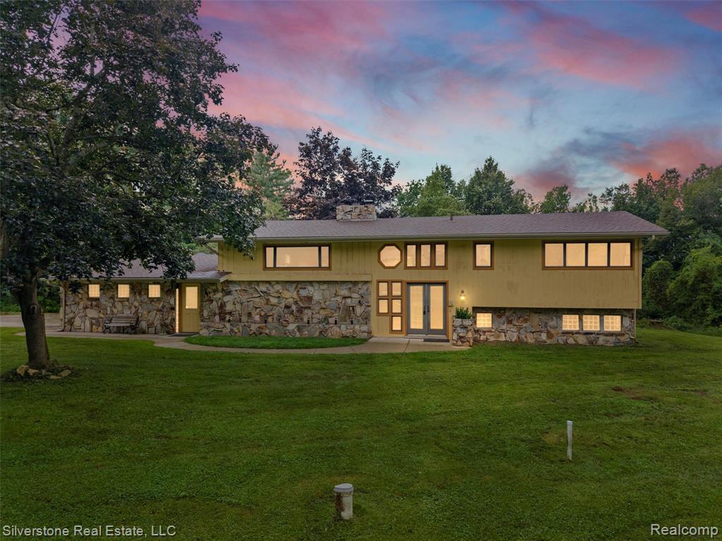 This charming 4-bedroom, 2.5-bath home is perfectly set on over 20 acres of stunning, partially wooded land. Recent updates include a brand-new roof, master bedroom picture frame window, construction upgrades, fresh paint, new flooring and trim throughout. Inside, you’ll find two cozy fireplaces that add warmth and character to the home. Outdoor enthusiasts will appreciate the abundant wildlife, with deer and turkey frequently seen across the property. The home boasts golf course frontage on Castle Creek Golf Course and a picturesque &#188;-acre stocked pond, best enjoyed from the newer back deck. For entertaining, the dreamy cement-floor pavilion offers an ideal gathering space. A true highlight of this property is the massive 7,200 sq. ft. pole barn—fully insulated, heated, and equipped with 400-amp service, providing more than enough power for any machinery or business operation. This home truly offers the best of both worlds: complete privacy surrounded by nature, with convenient access to nearby amenities.