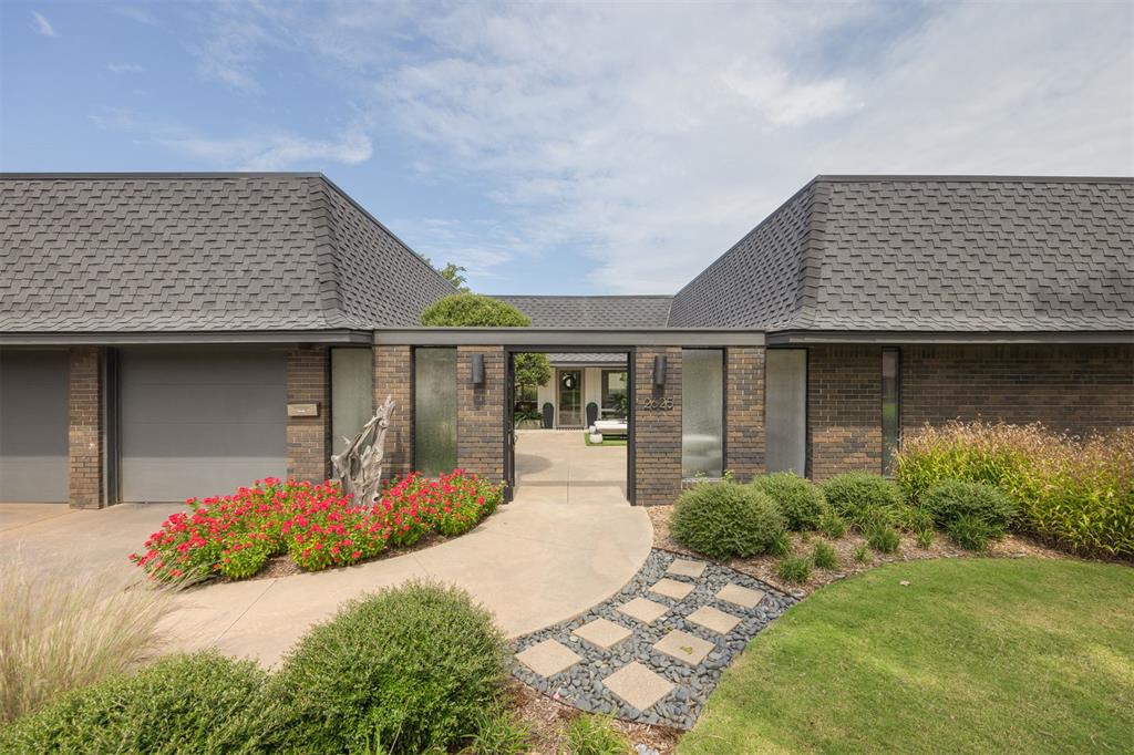 *OPEN HOUSE SUNDAY SEPT 14 FROM 2 to 4 PM* A home of unparalleled design and style - welcome to 2625 NW 58 Place in beloved Belle Isle. It’s “out of the ordinary” paired with sleek sophistication at every turn; an abode where the interior and the flourishing exterior are so seamlessly blended with one another. A courtyard greets you at the entrance and exists as the focal point of the home, with views of the courtyard from nearly every room inside. Upon entering, step in to a dazzling formal dining and living room that allow for the easiest entertaining. Large picture windows surround you, offering a space that is light, bright & immersed in natural light. This open space is sure to be a favorite, covered in terrazzo tile floors & laden with recessed lighting. Around the corner, you’ll find a second living space, this one with a cozier vibe & convenient wet bar. The kitchen features quartz counters, under cabinet lighting, freshly painted upper cabinetry, new hardware & classic tile backsplash. A powder bath & interior laundry are found off the living area. The primary suite is a true retreat; two incredible closet spaces, sliding doors leading to the courtyard & a bathroom with modern finishes, featuring double sinks & a walk-in shower. Two secondary bedrooms share access to a stunning full bath with marble finishes. The middle bedroom features a built-in desk, perfect for a home office. Your backyard dreams have come true! Enjoy every season on the sprawling patio with pergola and marvel at the lush landscaping. The cutest shed is great for a small workshop area or extra storage. Impactful upgrades include HVAC system in 2022, tankless water heater in 2018, fresh paint throughout in 2025 & in-ground storm shelter. Bursting with personality and originality in one of OKC’s endearing and desirable neighborhoods- this home is a special one. Being just blocks to The OAK development, Classen Curve, and Lake Hefner- this is the most prime location in all of the metro.