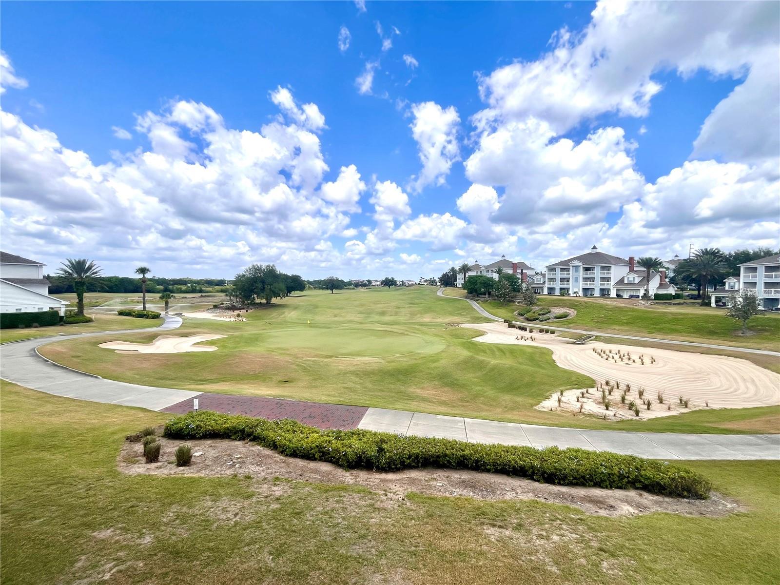 Welcome to Reunion Resort the only neighborhood with all three big names in signature Golf courses, Watson, Palmer and Nicklaus. Reunion is the premier luxury and vacation rental neighborhood in the Disney corridor, with 2,300 acres of wide-open views, luxury homes and world class amenities. The Heritage Crossing condos have some of the best views in Reunion, this home has a spectacular view of the green of hole 11 on the Palmer course. Condo is also close to main gate and is walking distance to Groceries, Liquor/Cigar Store, Bank, Dentist, Salon/Nails, and several new restaurants. HOA allows access to fitness center, dog park, playground and several pools throughout Reunion. There are two community pools within Heritage, both with stunning views just a short walk from the home. Building itself has just had a new Roof 2023 and New Paint 2025 exterior and interior common areas. Owners have enjoyed the property and rented it short term with a property manager which has been able to pay most of their expenses for owning. You must see the views from the two private porches. Please contact Agent for showings and questions on Reunion Golf Membership.