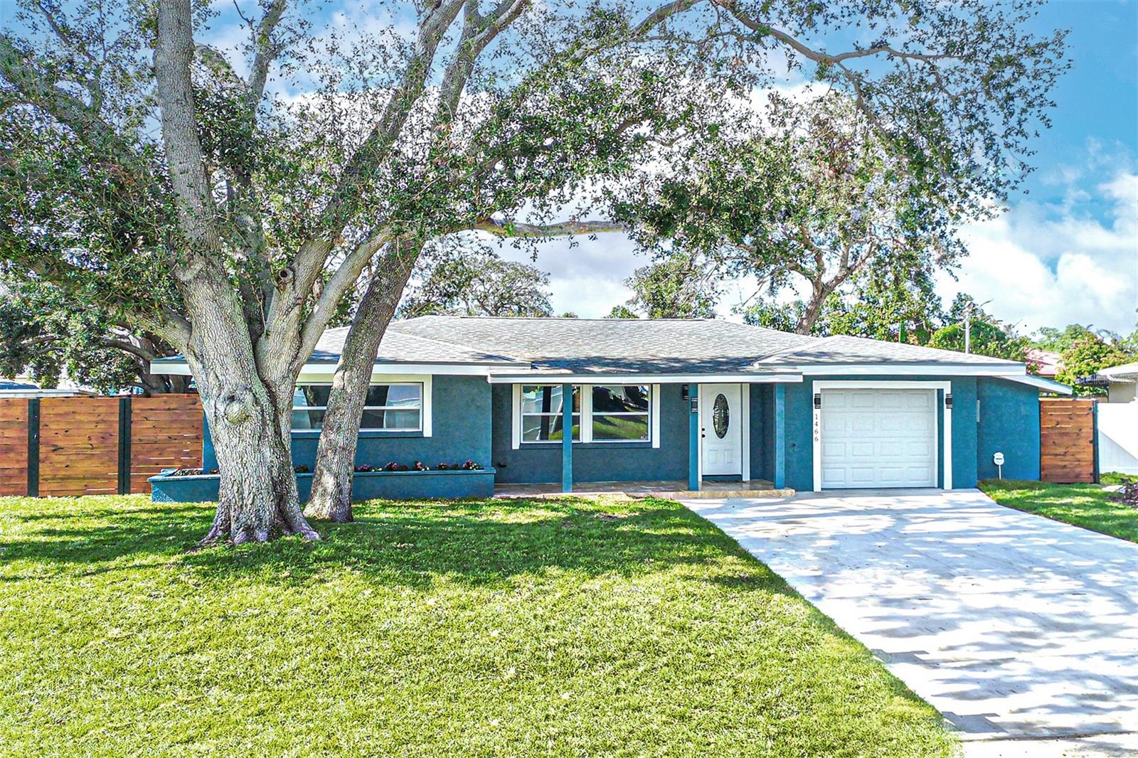 Freshly Renovated Clearwater Home – Move-In Ready!

This home offers countless upgrades including: New WINDOWS, A/C, stainless steel appliances, electrical panel and wiring, plumbing, water heater, driveway, irrigation, sod, septic tank & drain field (2023), ROOF (2017) and more—giving you peace of mind for years to come!

Step into this beautifully renovated 3-bedroom, 2-bath home where modern style meets everyday comfort. Designed with an open concept layout, the living, dining, and kitchen spaces flow seamlessly together, creating the perfect setting for family gatherings and entertaining friends.

The kitchen is the heart of the home, featuring sleek quartz countertops, stainless steel appliances, and plenty of space for cooking and conversation. A split-bedroom floor plan provides privacy, with the primary suite tucked away for peace and relaxation while two additional bedrooms share a stylish hall bath.

Outside, a brand-new wood privacy fence surrounds the backyard, making it ideal for weekend barbecues, playtime, or simply unwinding in your own private retreat.

This home offers countless upgrades including: roof (2017), new windows, A/C, electrical panel and wiring, plumbing, water heater, stainless steel appliances, septic tank & drain field (2023), driveway, irrigation, sod, and more—giving you peace of mind for years to come.

Perfectly located in unincorporated Pinellas County, Flood Zone X, you’ll enjoy quick access to Tampa, St. Petersburg, Safety Harbor, Dunedin, and Clearwater’s world-famous beaches. With parks, golf courses, shopping, and dining just minutes away, you’ll have everything you need right at your doorstep.