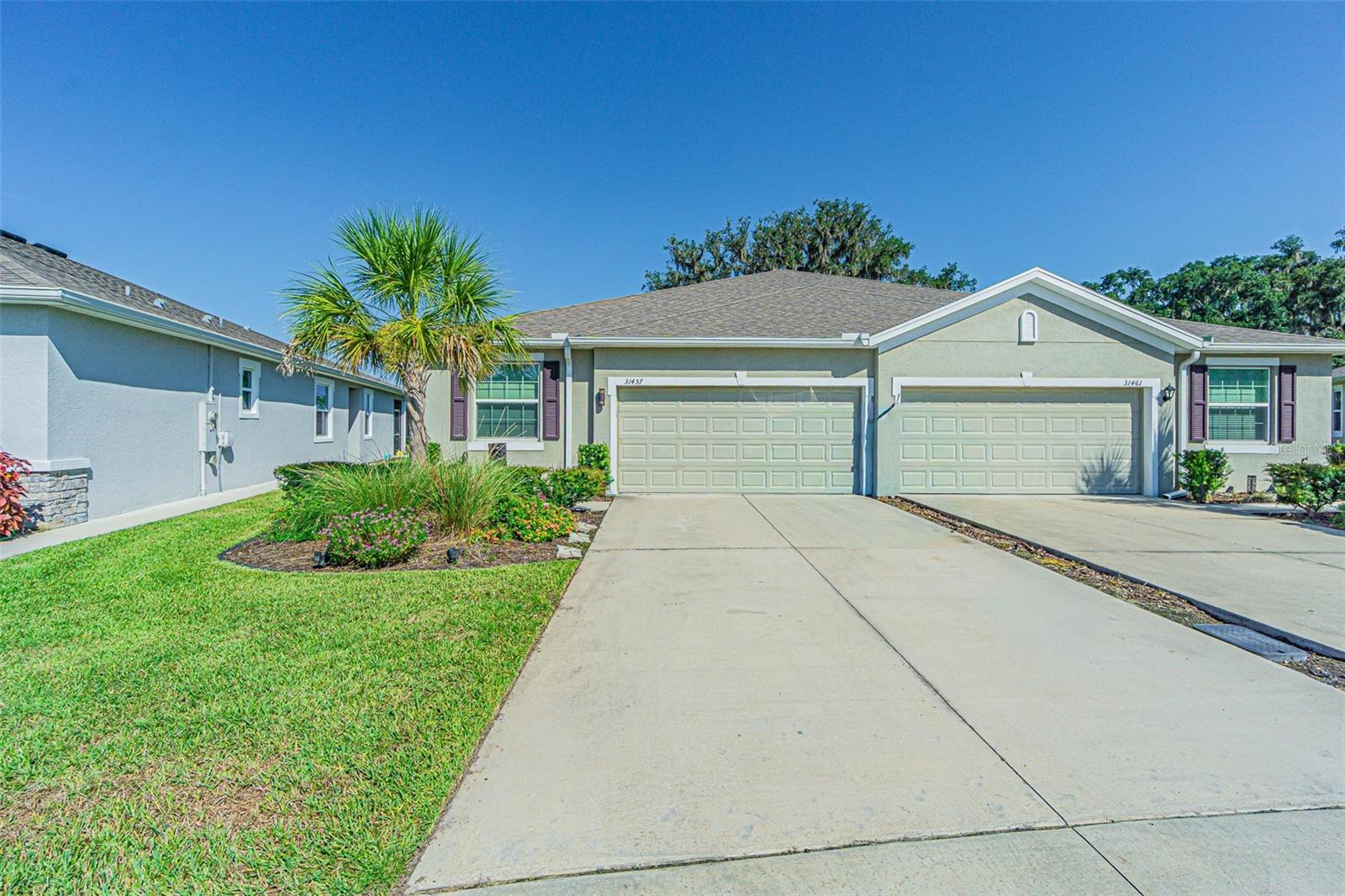LIVE like you are on VACATION everyday in this Stunning Siesta floorplan villa in Mirada!  This 3 bedroom, 2 bath, 2-car garage home offers 1,587 sq. ft. of living space on a rare OVERSIZED 10,000 sq. ft. pie-shaped PREMIUM lot with CONSERVATAION and WATER views.  Features include lofty 9’4” ceilings, 18” tile in main areas, French doors to a flex/office, tray ceiling in the primary suite, and a screened lanai with breathtaking sunsets!  The gourmet kitchen shines with 42” espresso staggered cabinets with crown molding, granite counters, subway backsplash, and stainless Whirlpool appliances.  Additional upgrades: smart home system, washer/dryer with storage, new lighting, and garage shelving.  Built by D.R. Horton, this villa was carefully designed with a bright open layout which makes entertaining a breeze. Tropical Bahama decor in the casually elegany primary suite features a tray ceiling, large windows overlooking conservation, plus a spa-like bath with granite counters, rubbed oil bronze fixtures, and ample storage.  Additional upgrades include new lighting and ceiling fans, shelves added in the garage, and a utility closet with washer/dryer and overhead storage.  The screened lanai offers breathtaking sunsets and serene views of two ponds and conservation, creating the perfect outdoor retreat to REST EASY!  This smart home comes equipped with an ADT alarm, sprinkler system and D.R. Horton’s suite of connected home products, plus the convenience of maintenance-free living that includes exterior upkeep, lawn care, basic cable, internet, and trash service included so you have time to enjoy the amenities.  At Mirada, you’ll enjoy a true “Live Where You Vacation” lifestyle, highlighted by the Metro Lagoon’s largest multi-acre Crystal Lagoon, featuring sandy beaches, swim-up bars, kayaking, paddle boarding, on-water obstacle courses, and cabanas.  The community also boasts the Connected City infrastructure with the fastest Wi-Fi speeds in the nation, making it ideal for work, play, and everything in between. Conveniently located in San Antonio, Florida between Wesley Chapel and Historic Dade City, just North of Tampa.  Easy access to major highways for easy commute to Shopping, restaurants, medical facilities, Ocala, Lakeland, Tampa, Orlando, Airports and Florida's famous Beaches!  CALL TODAY!