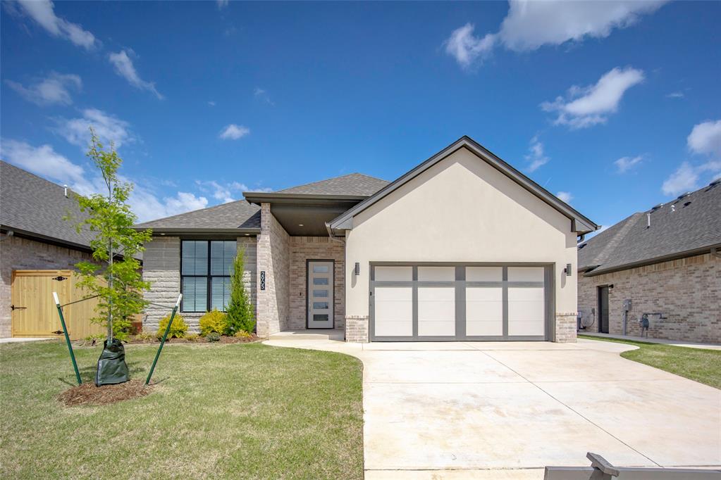 SANDOVAL SPECIAL!!! Builder offering $20,000 in incentives through the month of April! Incentives can be used for closing costs, upgrades, or rate buy-downs. FENCES INCLUDED so NO need to use incentive on this! Welcome to this BRAND NEW ADDITION in SOKC. Be a part of the maintenance free community behind the GATES with a LOCK and LEAVE lifestyle. Great curb appeal with STUCCO fronts. The interior has a WOOD LOOK TILE through the main areas with an OPEN CONCEPT kitchen. The living area has custom FIREPLACE with wood surround to the ceiling. Kitchen features: BOSCH APPLIANCES, QUARTZ tops, cabinets to ceiling with lighting in the uppers, GAS RANGE, pot filler faucet, and HUGE walk-in PANTRY. The primary sits at the back and is large with a beautiful ensuite that includes: a DOUBLE VANITY, under cabinet floor lighting, SHOWER WITH SEATING, and a large walk-in closet. The back yard has a large PATIO with plenty of space. UPGRADES: SPRINKLER SYSTEM, Smart Home Security, FENCE, blinds, 8' interior doors, and a TANKLESS water tank. HOA covers mowing and will have a COMMUNITY CLUBHOUSE.